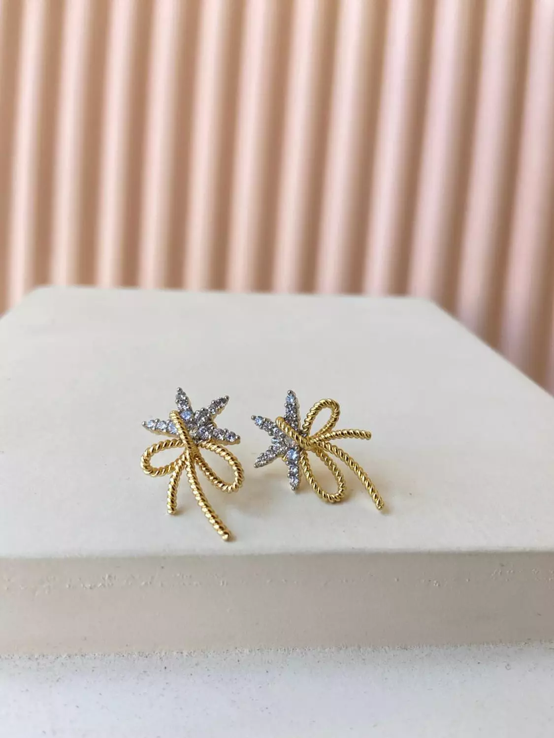 <h3><span style="color: #ad8c90">Earrings</span></h3>