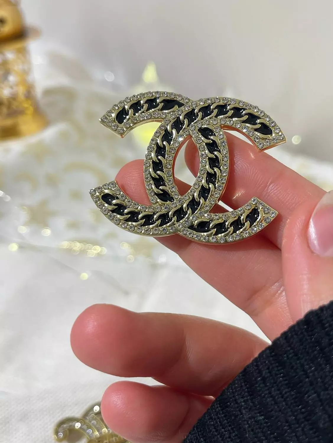 Black channel brooch  image