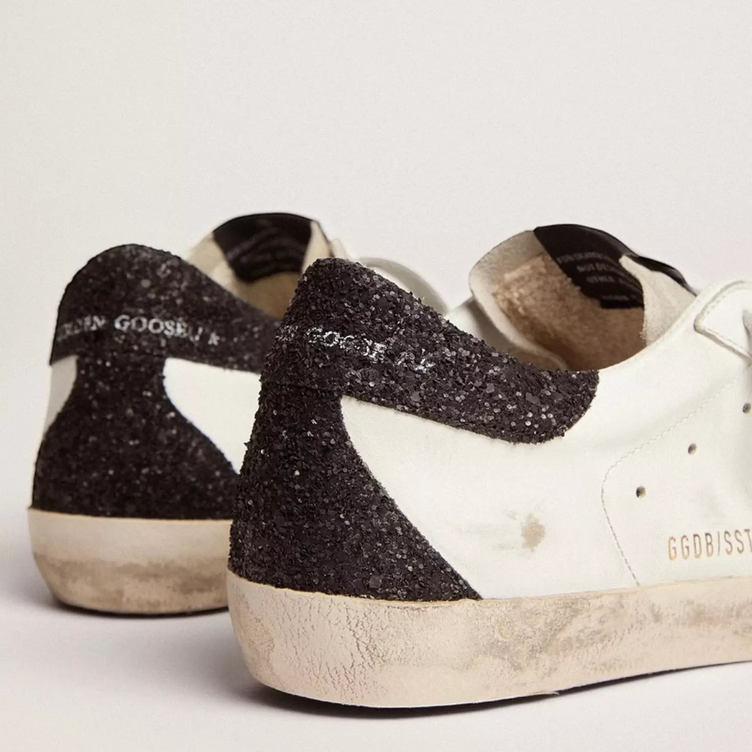 Golden Goose Super-Star in nappa leather with gold glitter star and black glitt 1