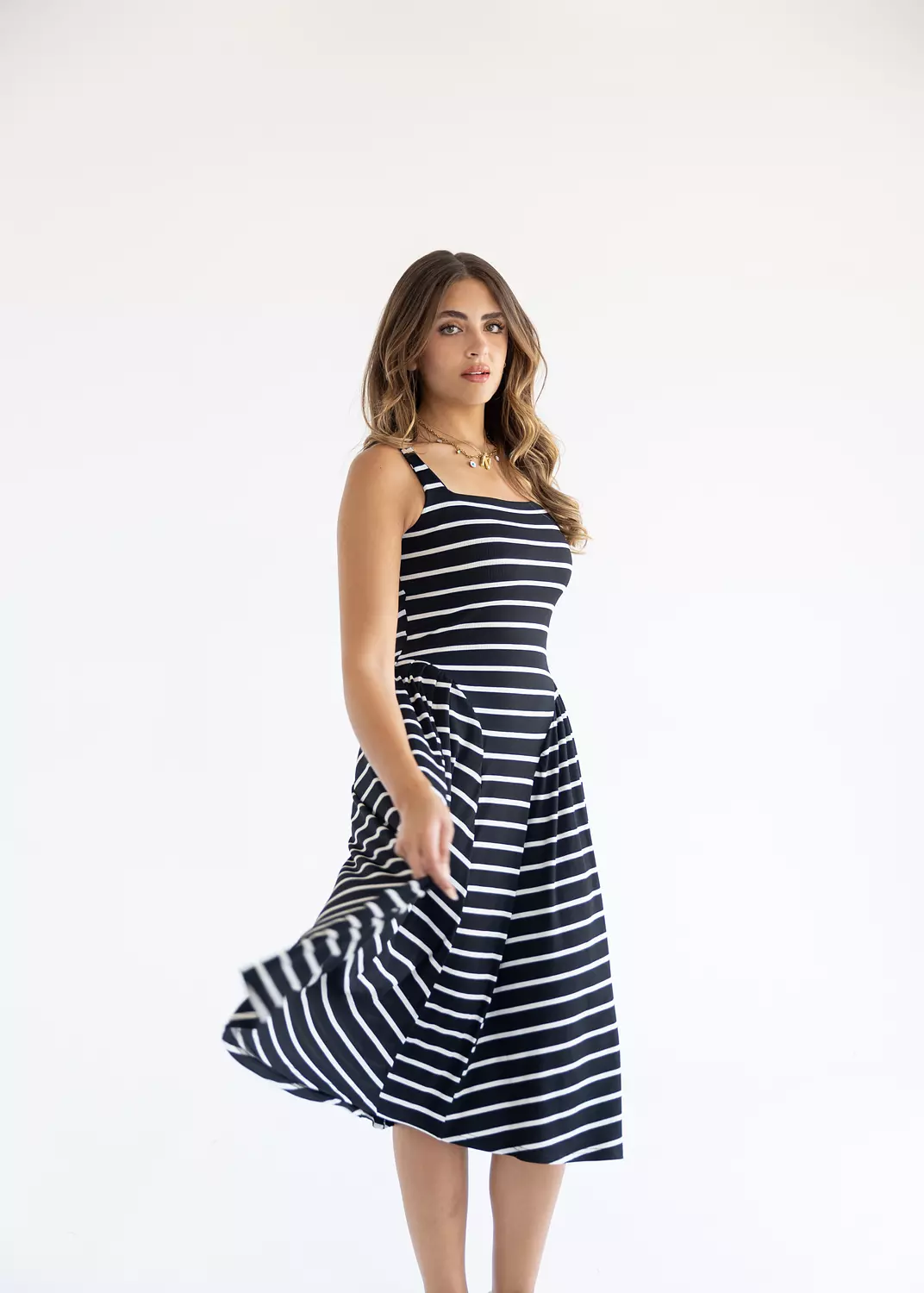 <p style="text-align: start">Name</p><p style="text-align: start">Midi dress</p>