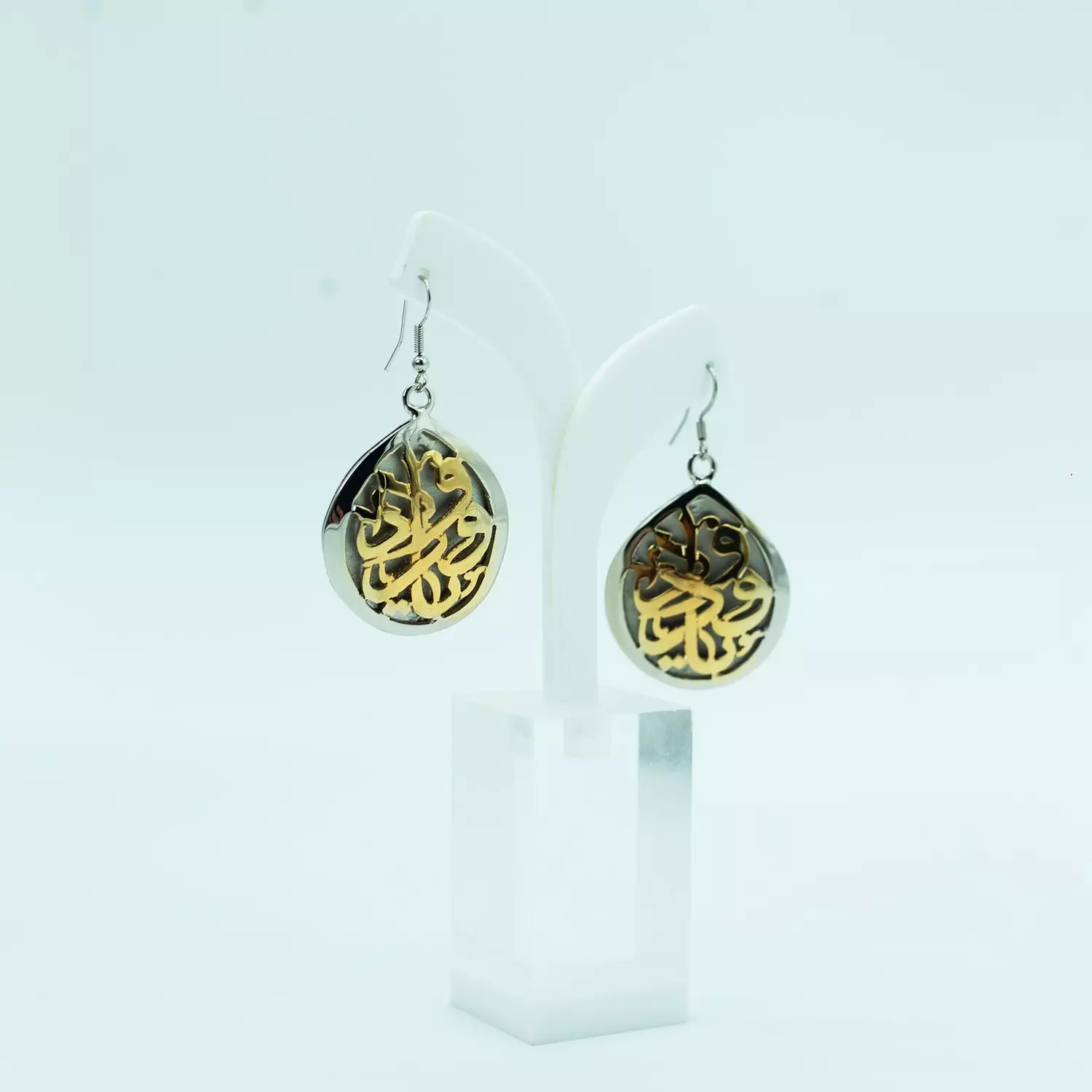 Two-layer copper hoop earrings, curved, sculpted, and plated with matte and shiny gold, silver, and platinum, with a mother-of-pearl stone. 2