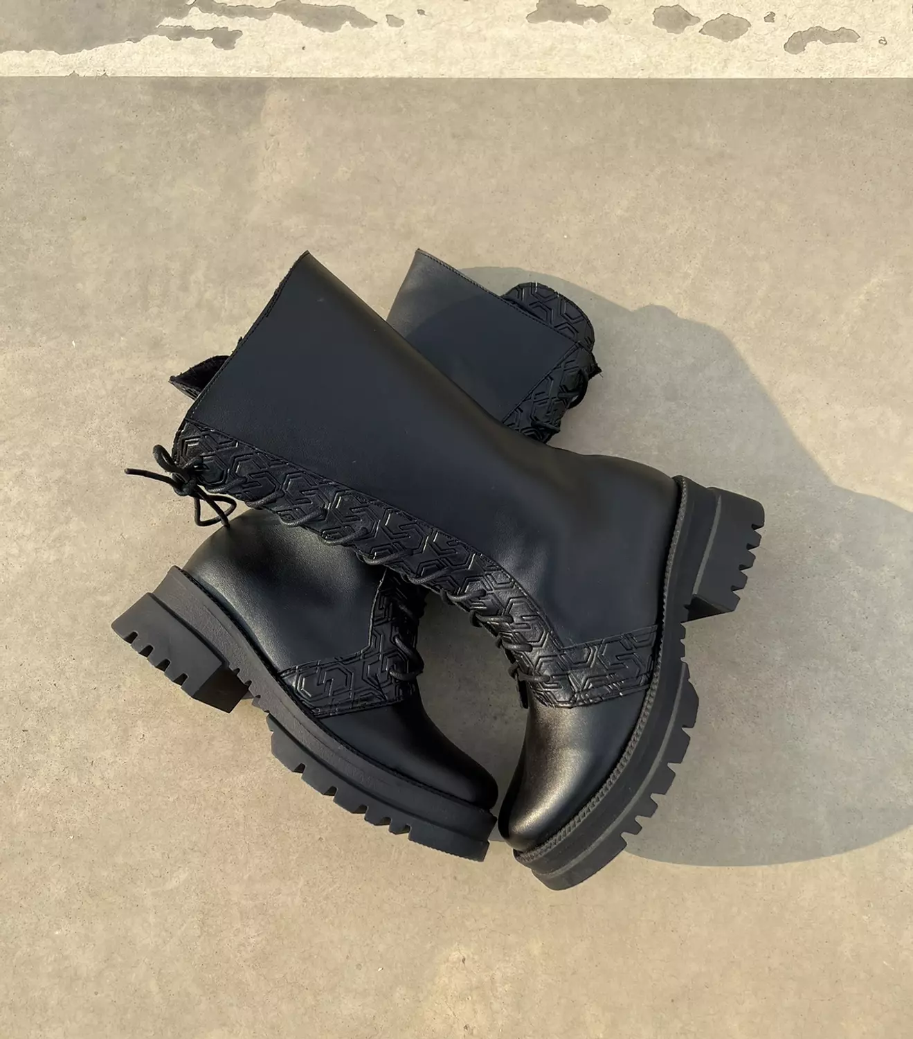 Cocan monogram High boots hover image