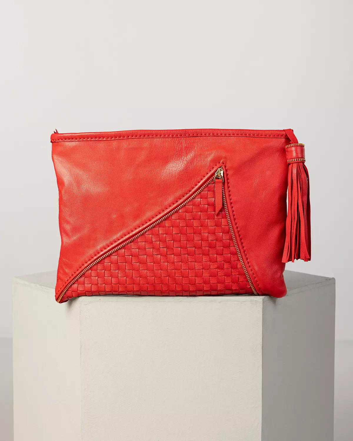 The Woven Zippered Clutch hover image