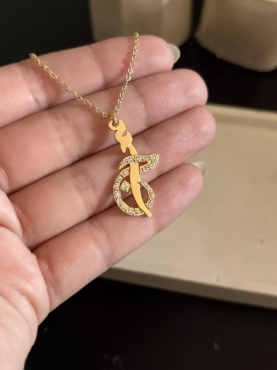 Merged letters necklace 1