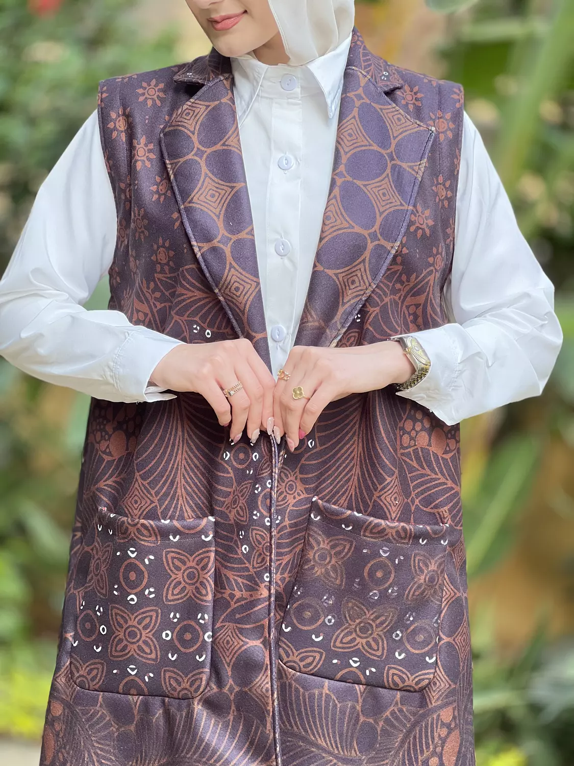 Brown ornamental vest hover image