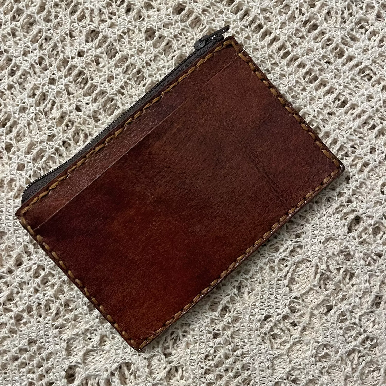 Zipped plain leather card holder hover image