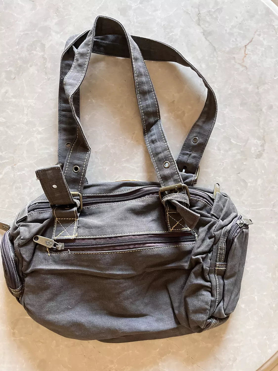 Grey diesel denim bag hover image