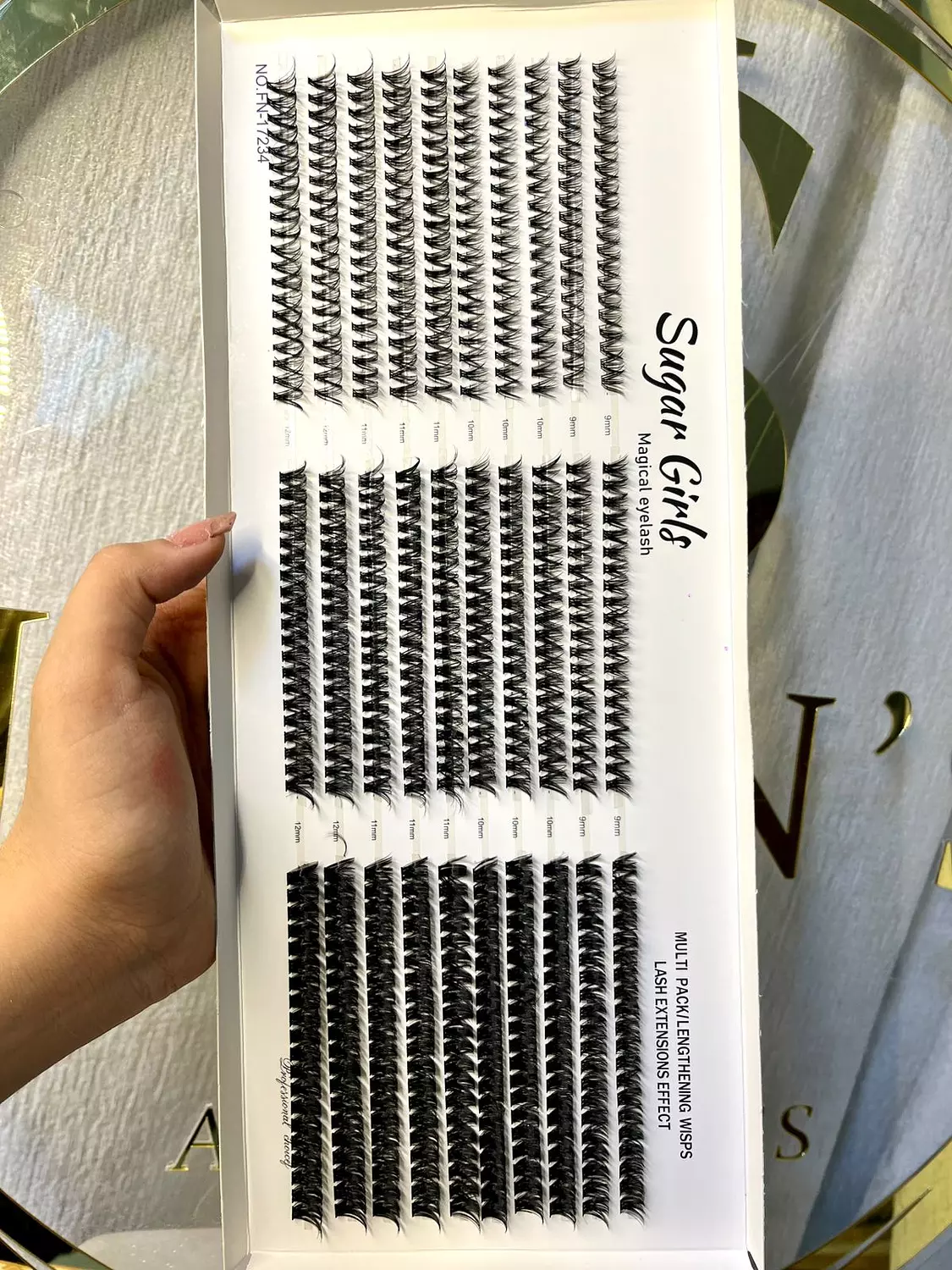 lashes sugar girl orange hover image