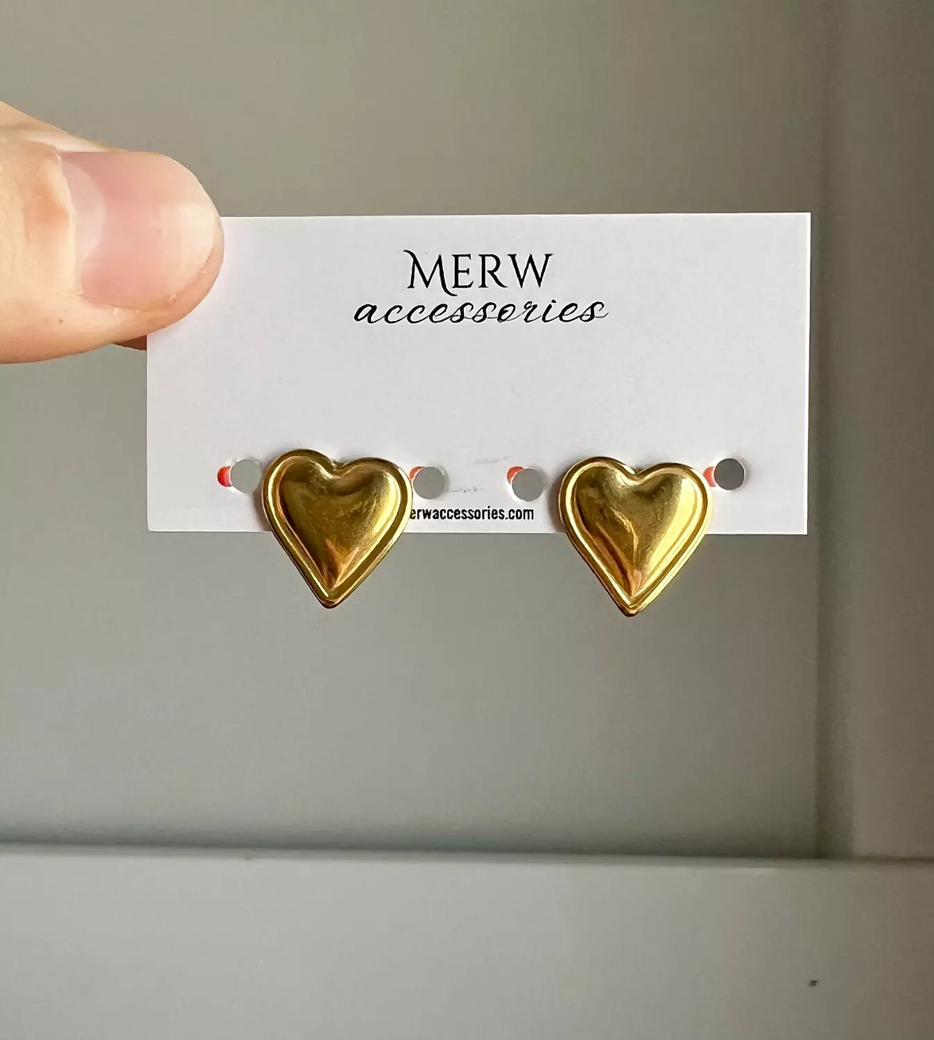 Gold heart earring  image