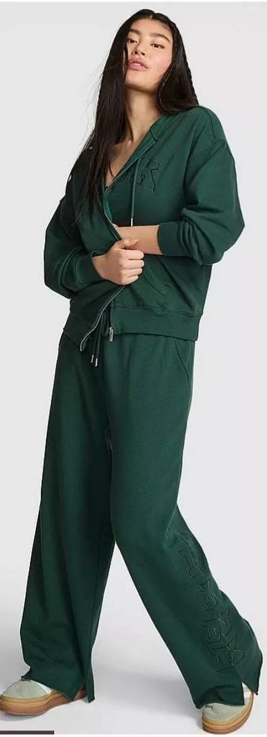 full-zip hoodie with an oversized fit and a subtle, tonal embossed logo on the chest. hover image