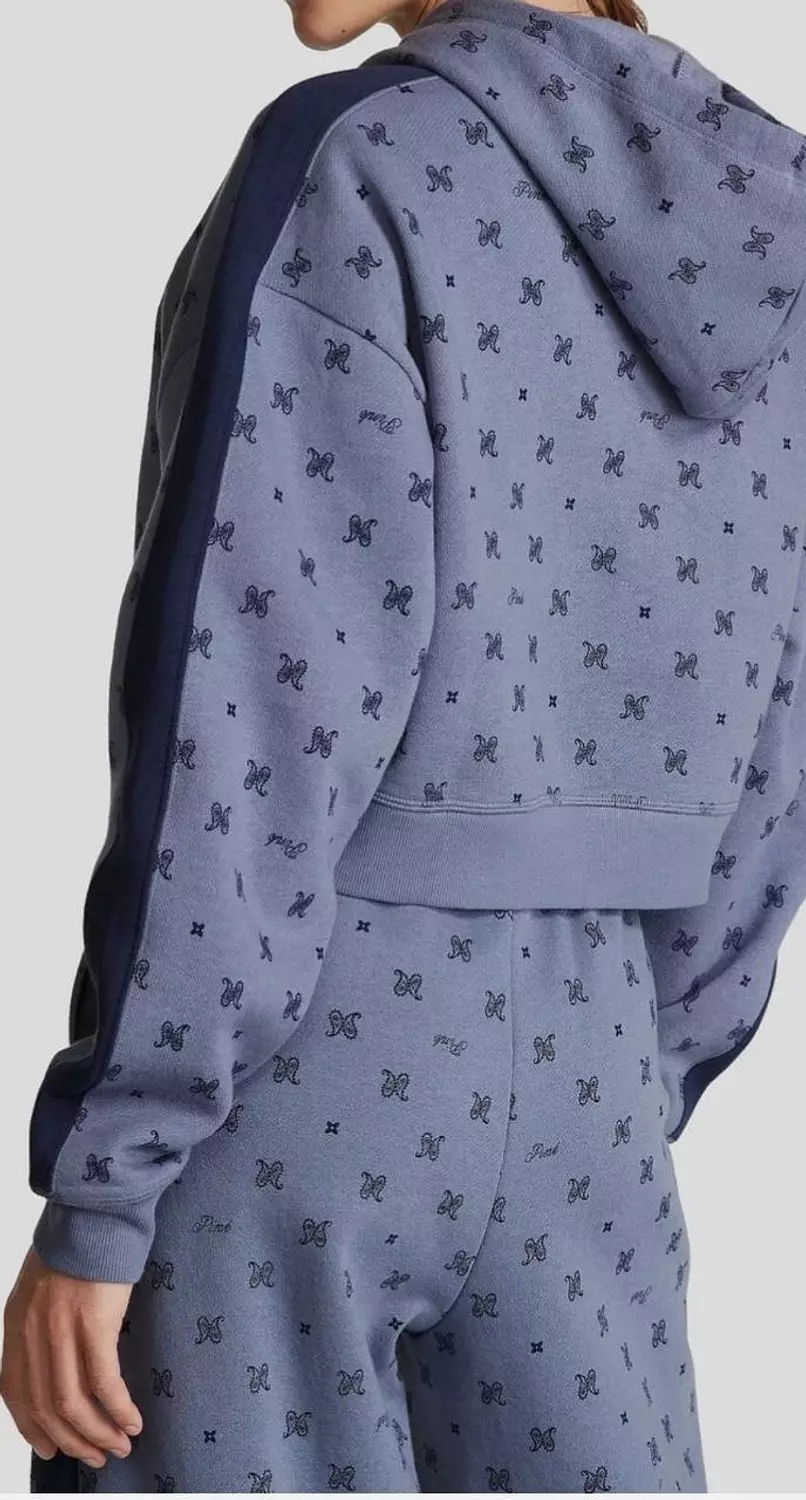 two-piece coordinated set featuring a cropped hoodie and matching joggers. hover image