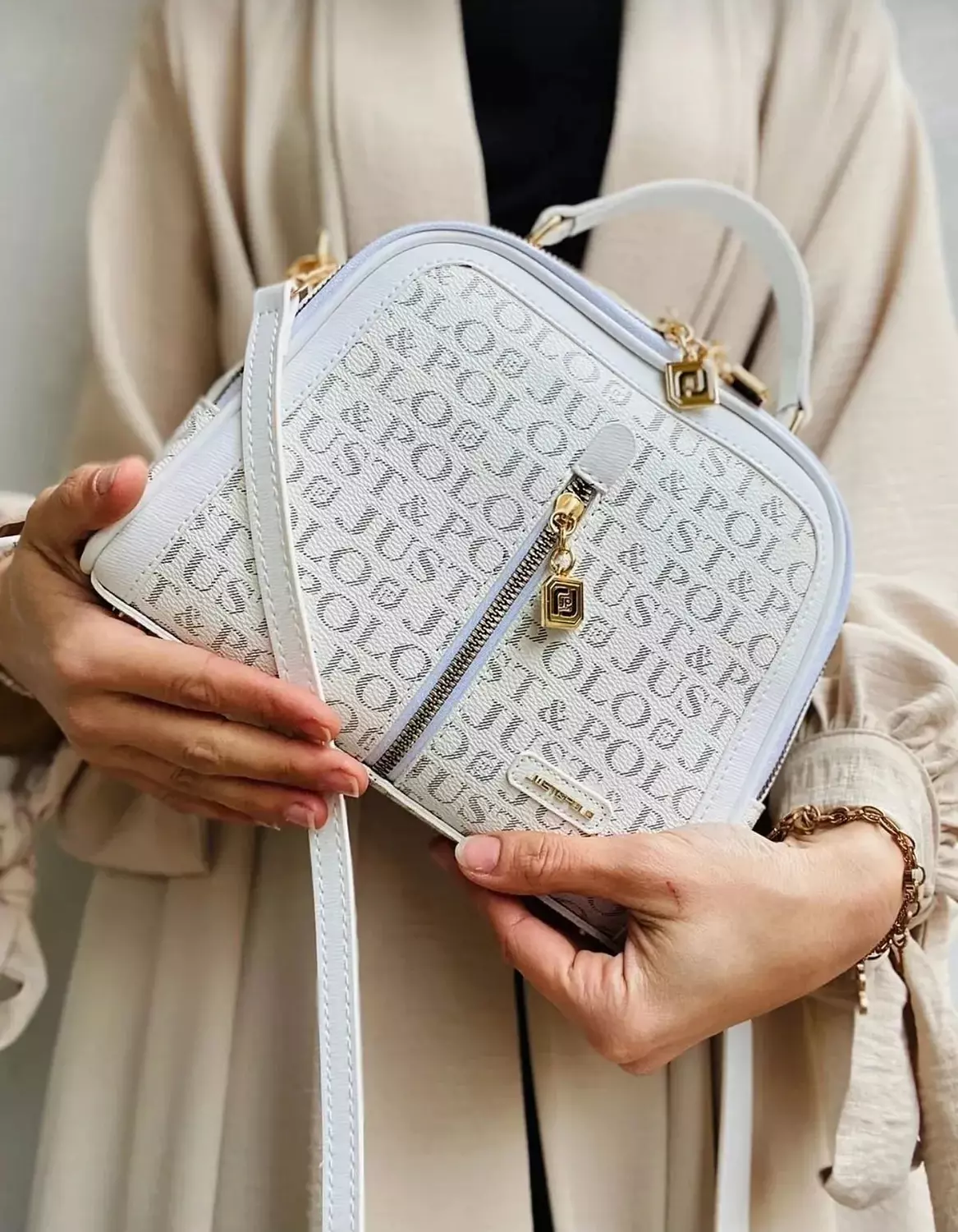 White Monogram Handbag with Gold Accents and Adjustable Strap 3