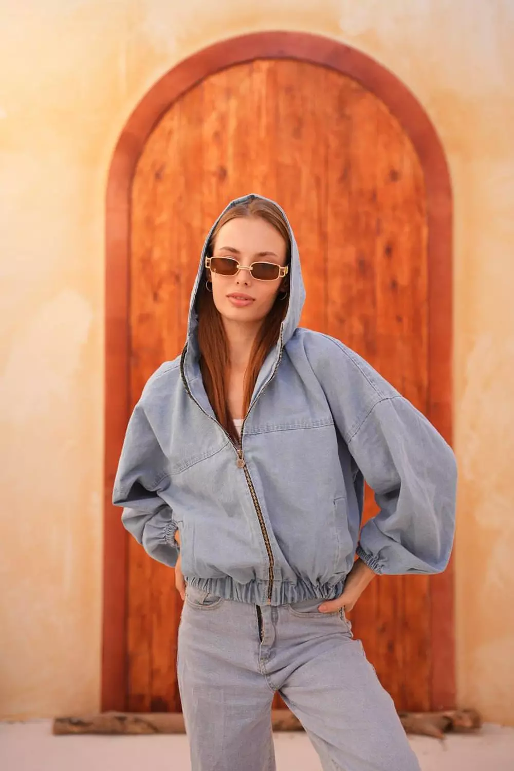 hooded denim jacket image