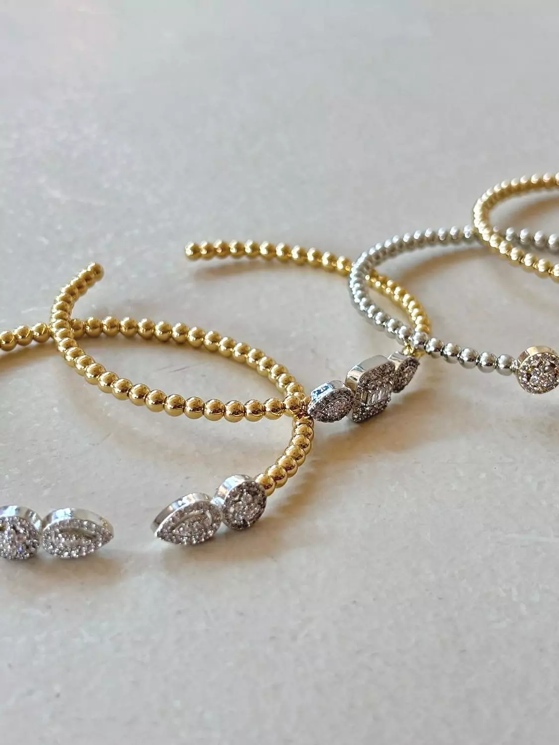 <h3><span style="color: rgb(173, 140, 144)">Bangles</span></h3>