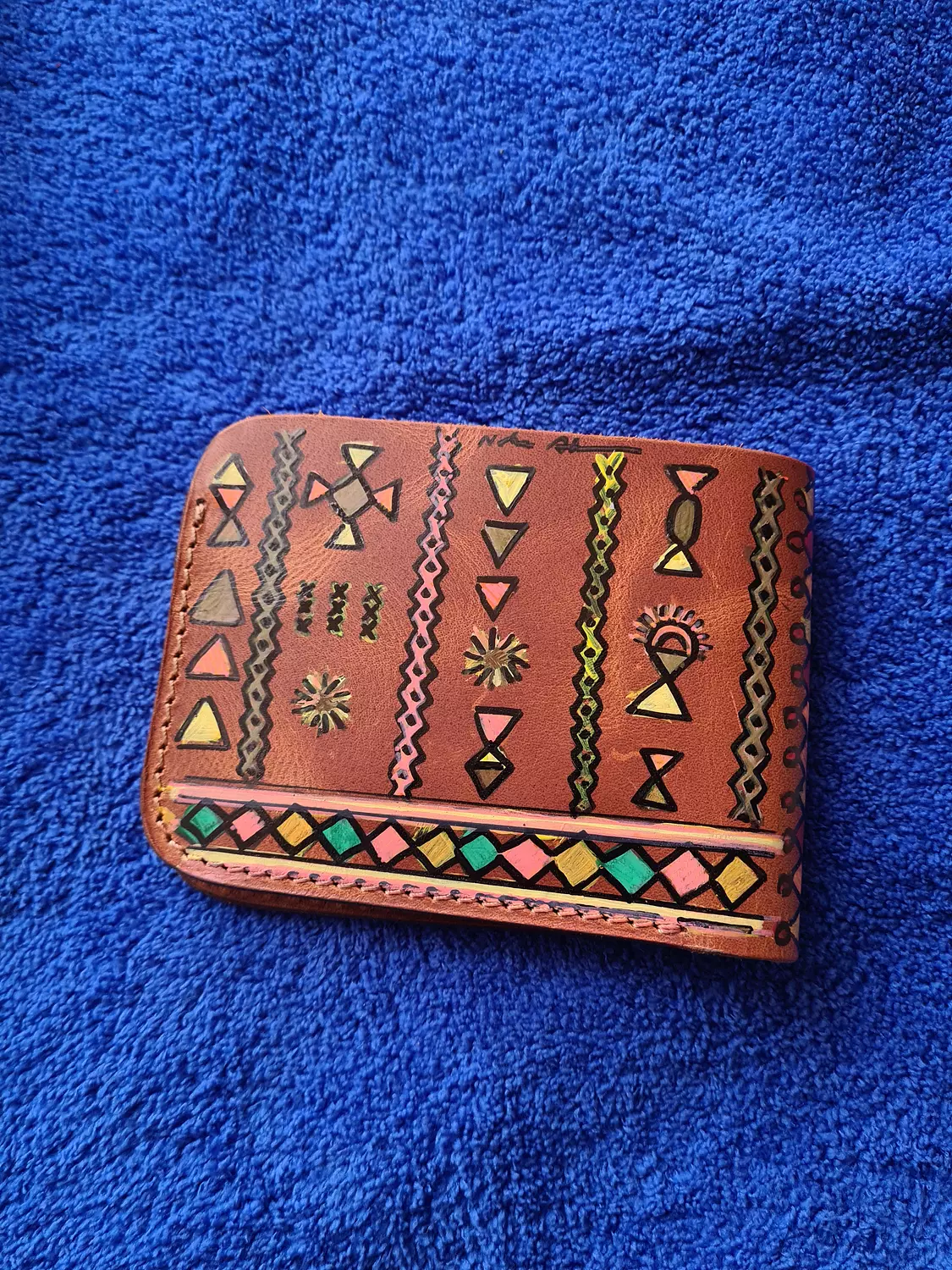 The bedouin face wallet  image