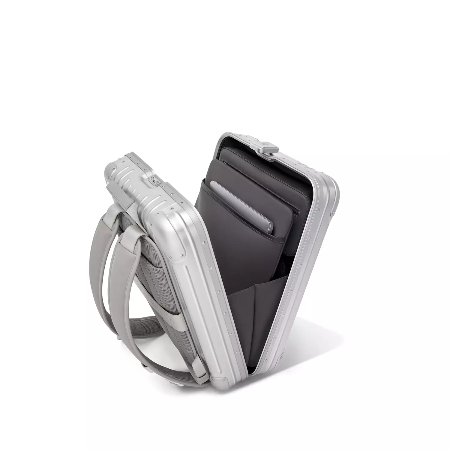 Rimowa Original Backpack is a sleek, silver hard-shell backpack 5