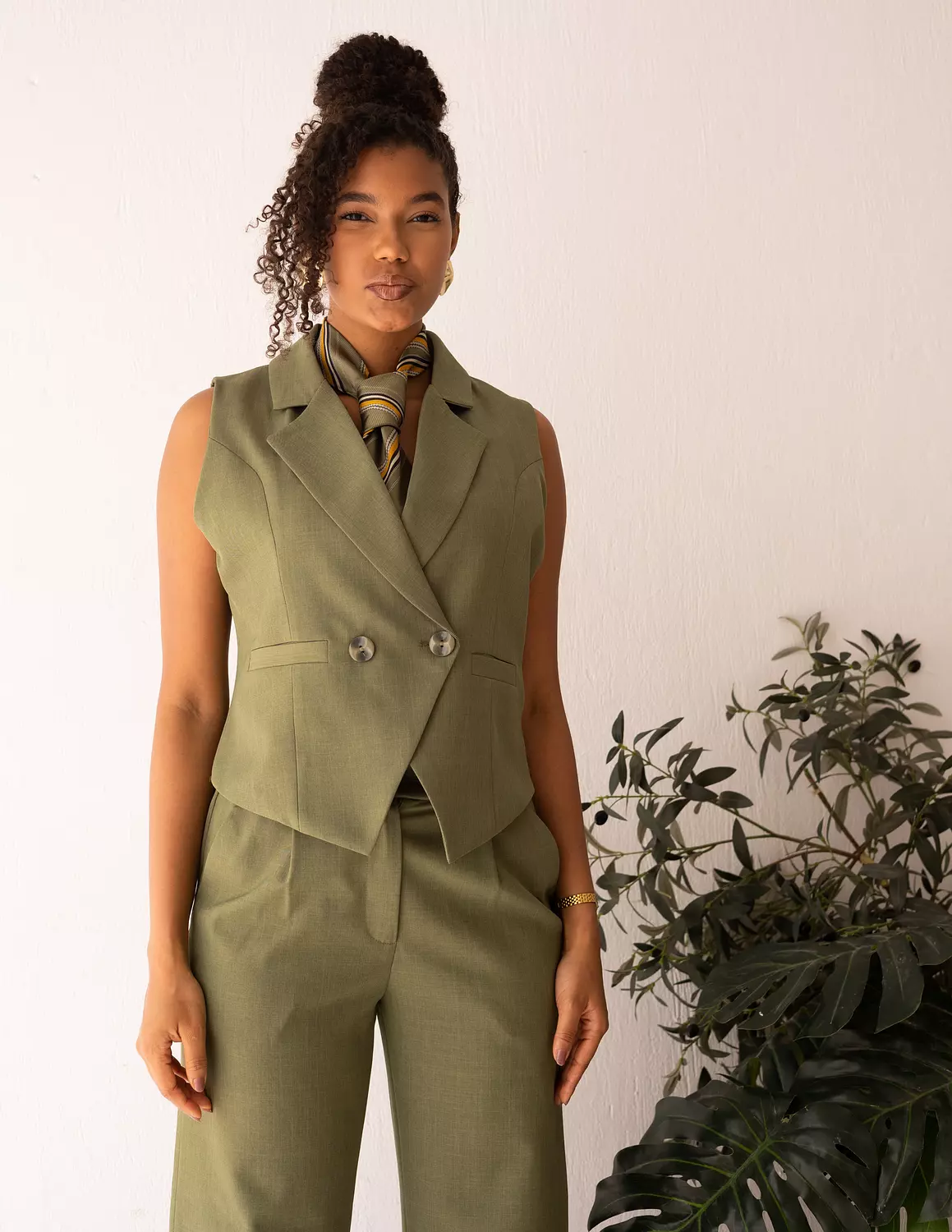 <p>Double breasted cropped vests</p>