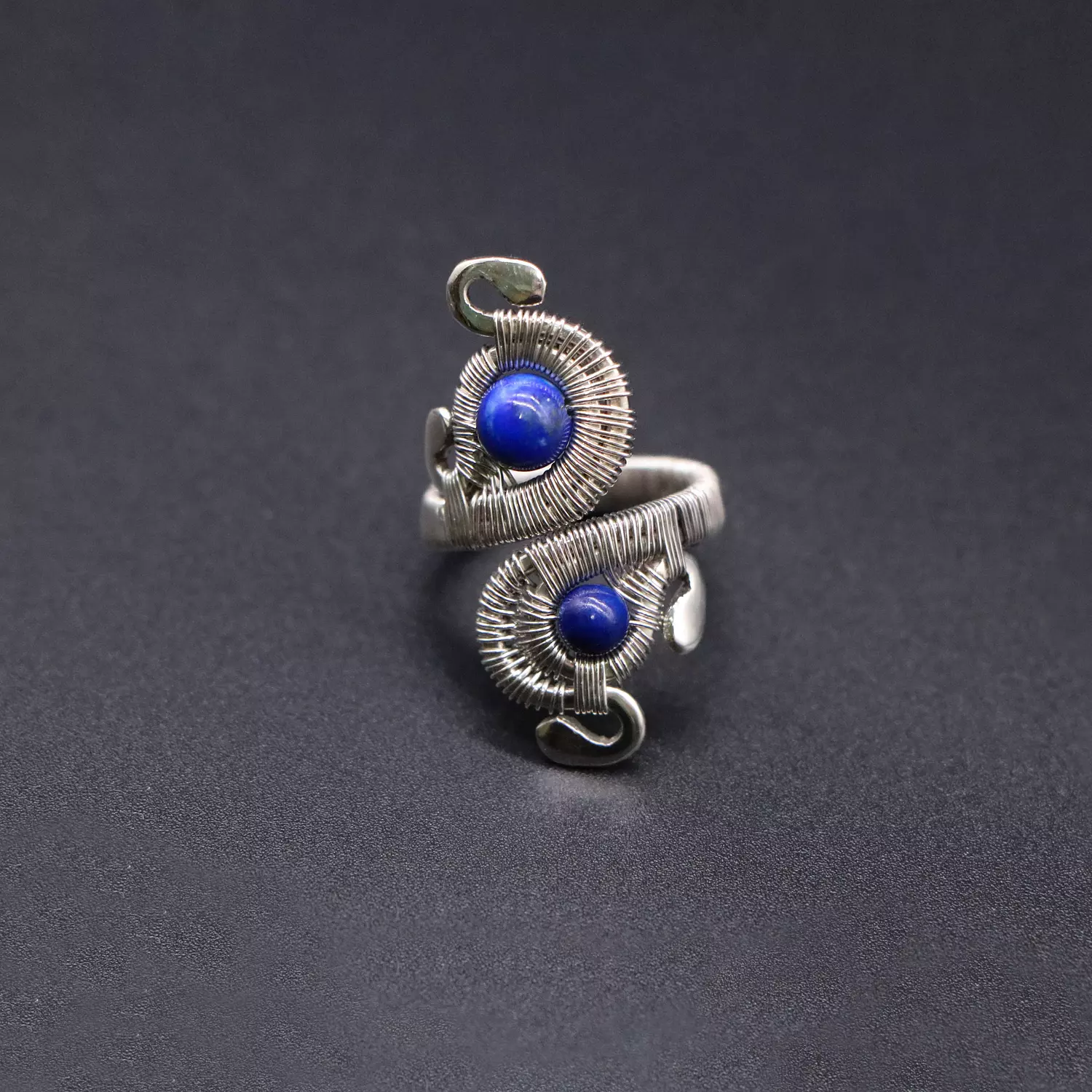 Wire wrapped silver ring with Lapis lazuli gemstones. image