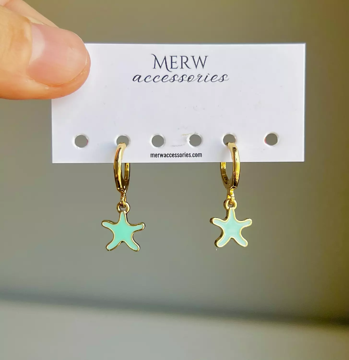 Aqua small star earring  image