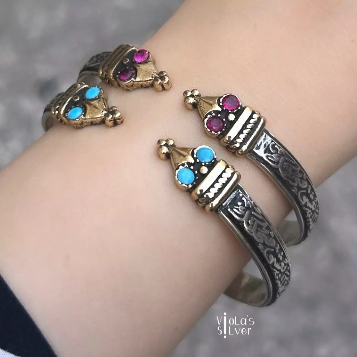 Calligraphy handcuff with stones image