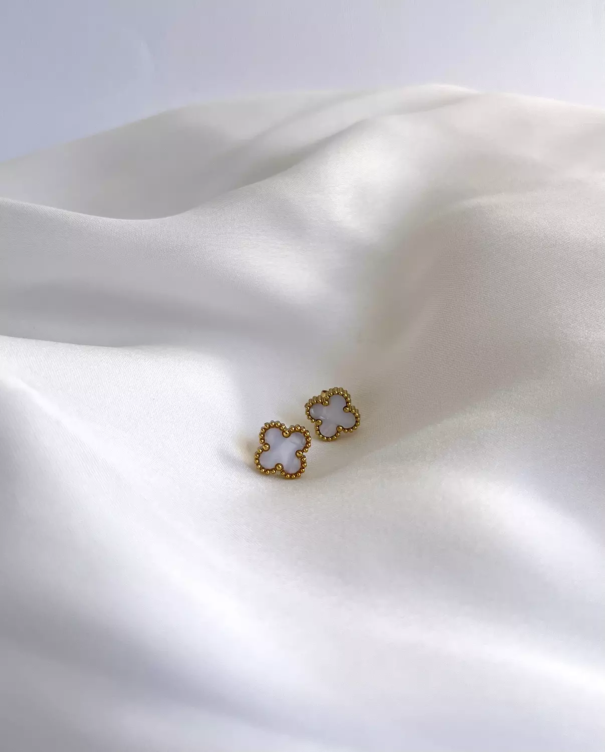 White pearl van cleef studs 1