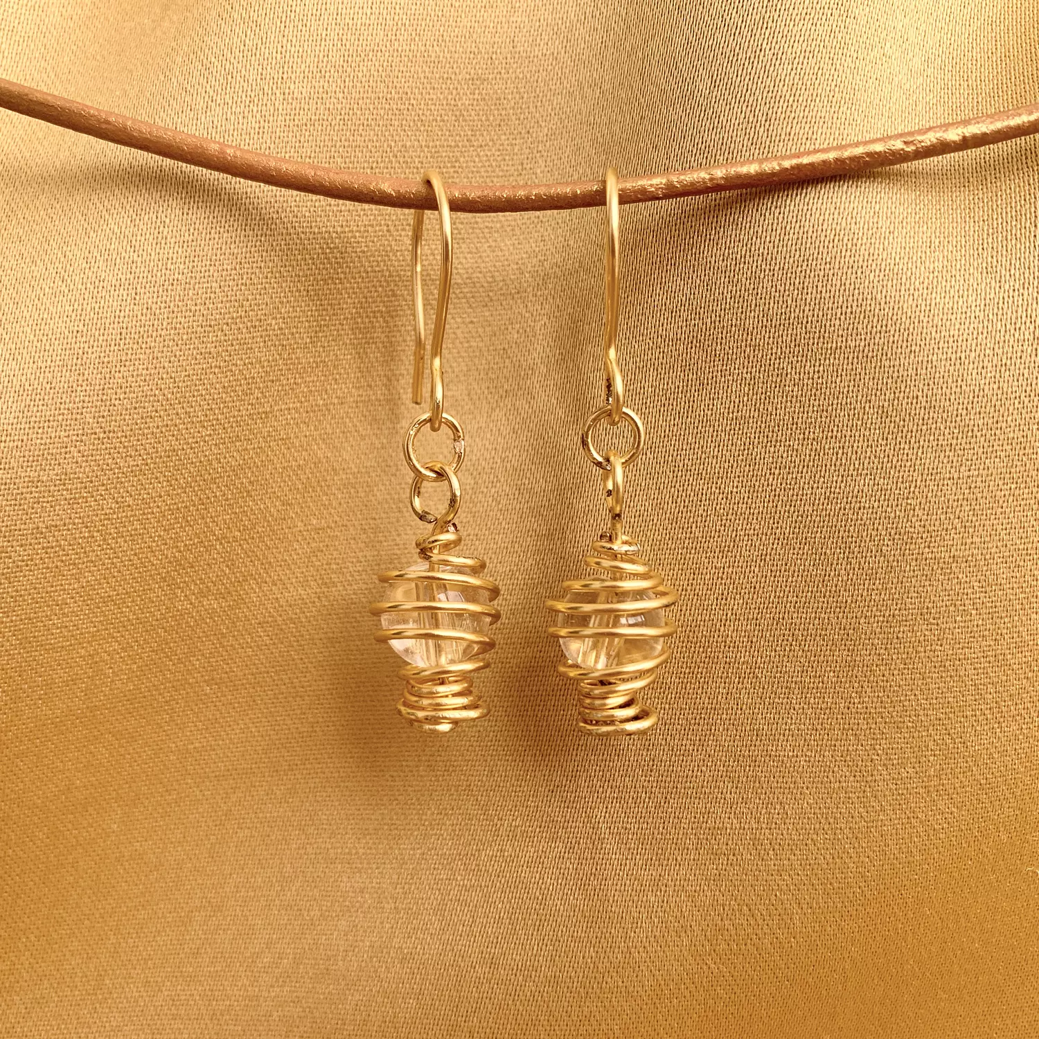 <h3 style="text-align: center"><span style="color: #fa9084">Round Fanoos Earring</span></h3>