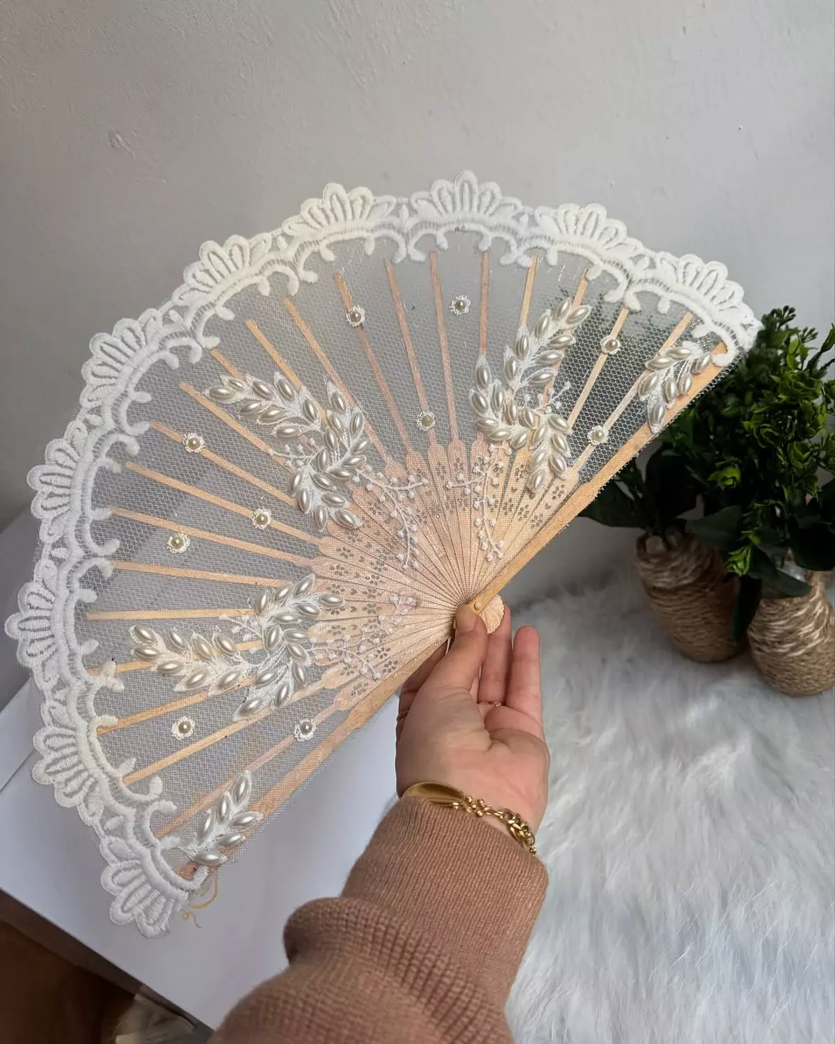 Lace fan adorned with elegant embroidery 1