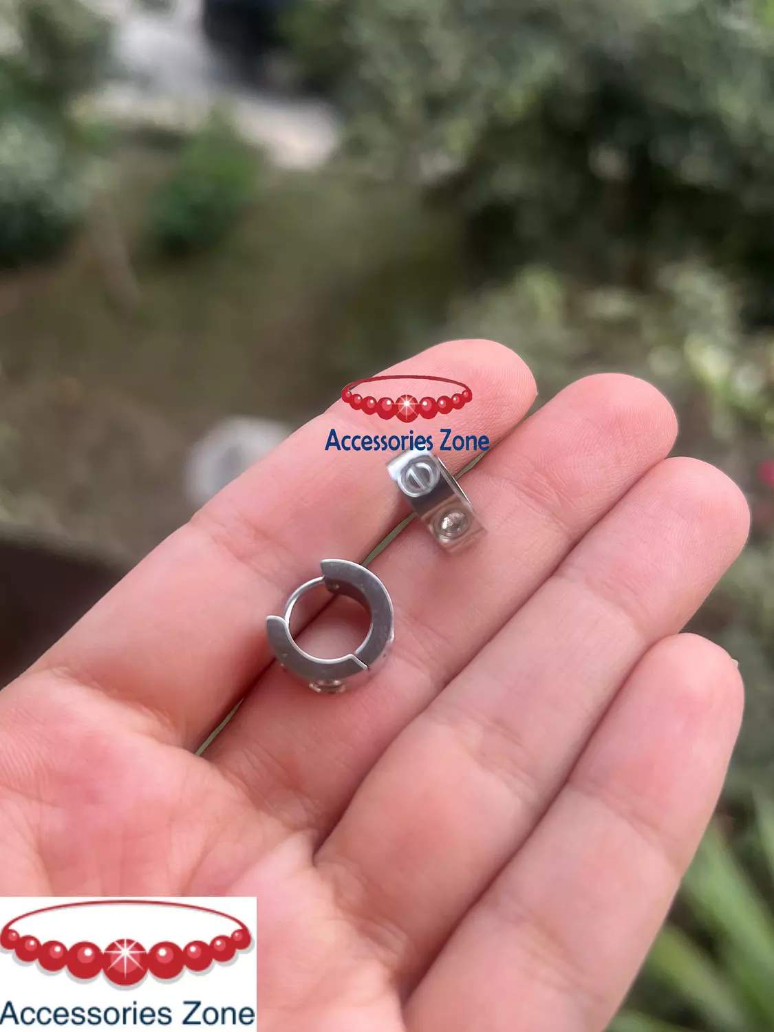 Silver carti*r earring  1
