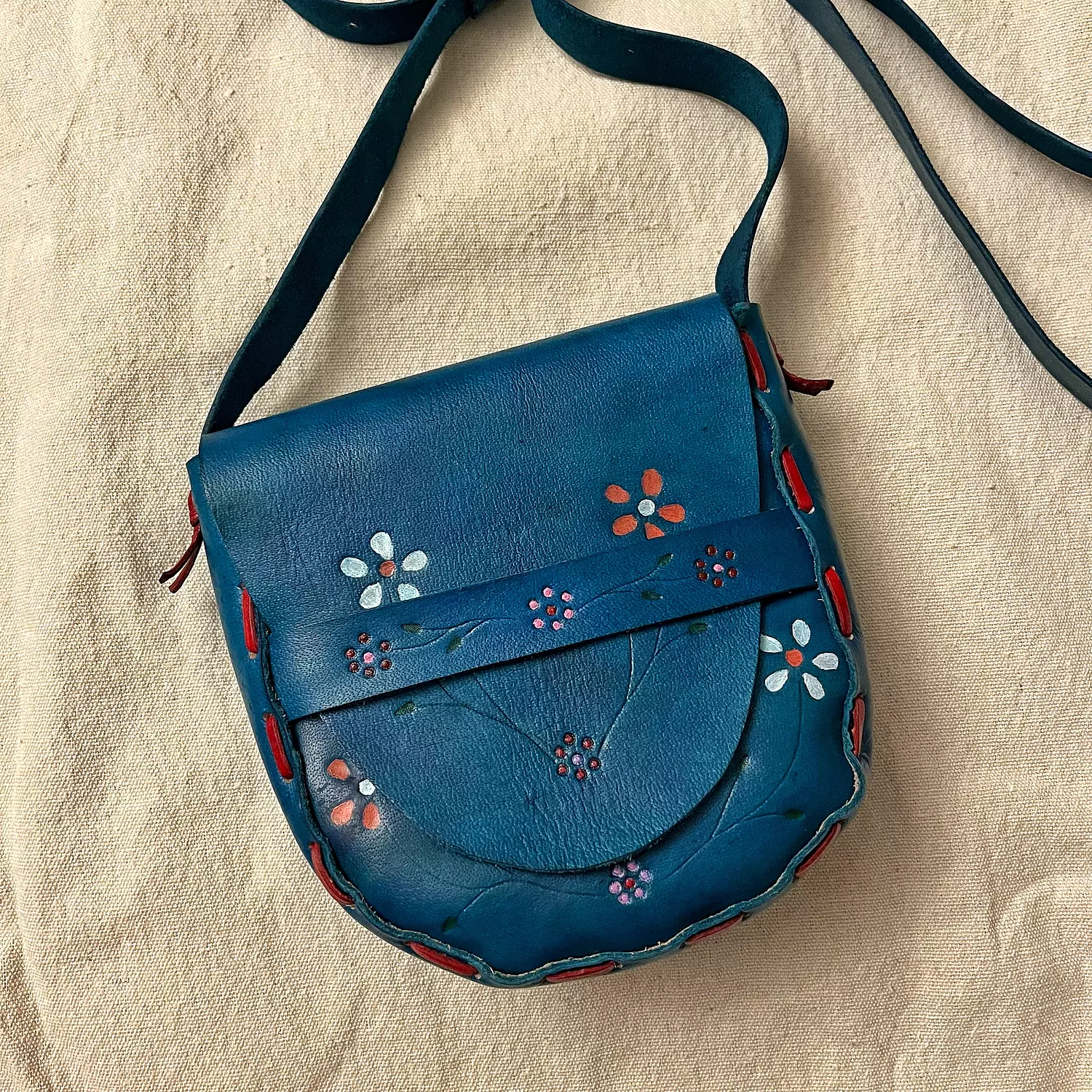 Colorful flowers leather bag with closure strap image