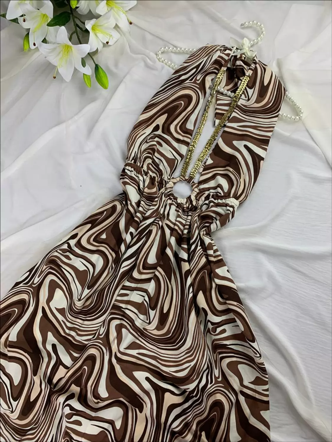 Long backless dress with gold necklace from splash hover image