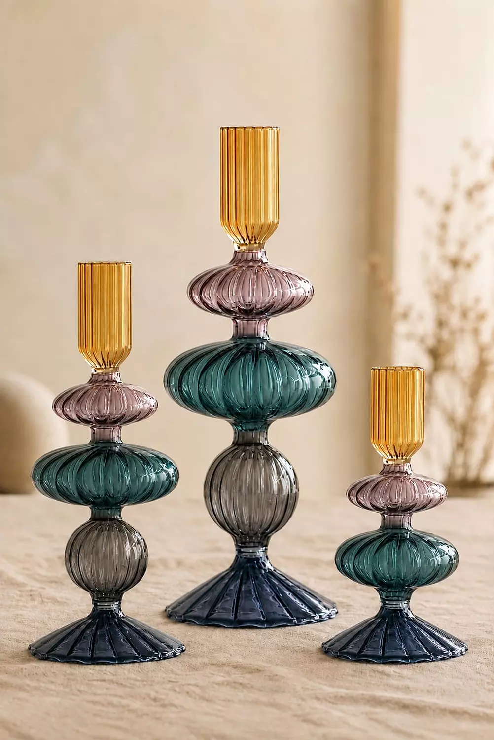 A Set of three candle holders 2