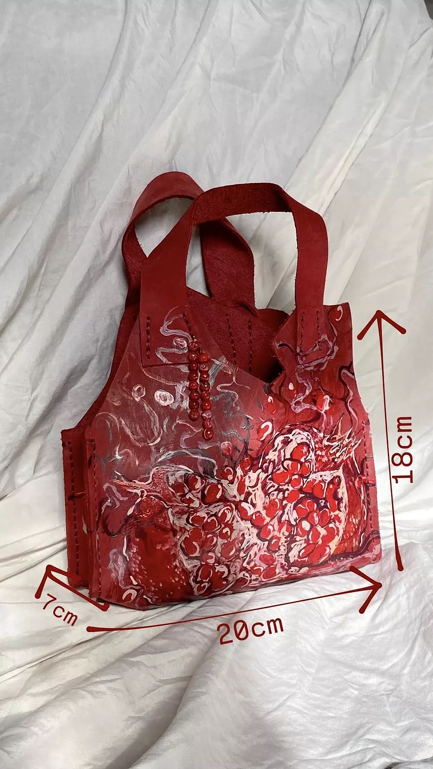 The “ pomegranate bag” hover image