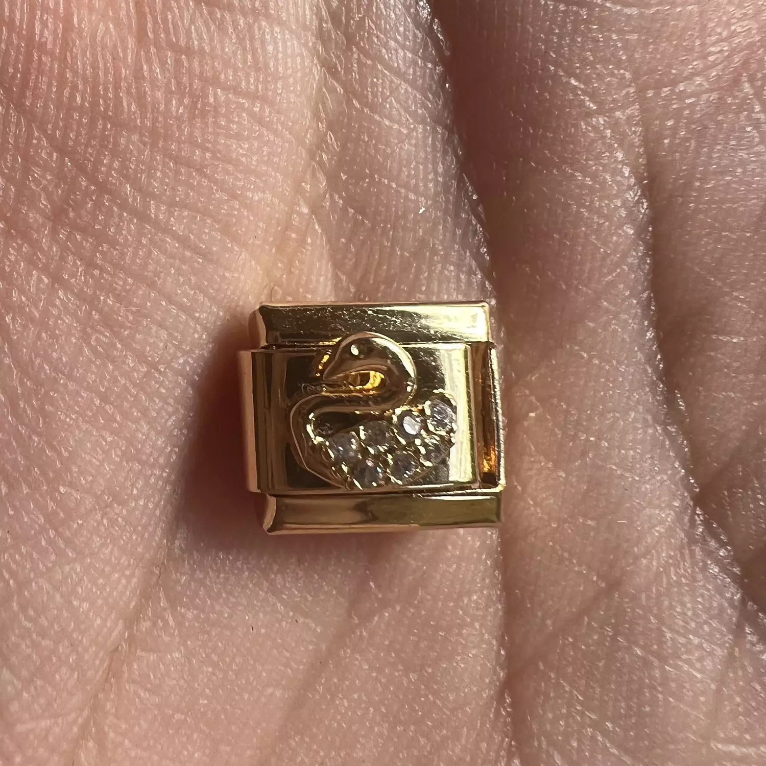 Gold swan charm  image