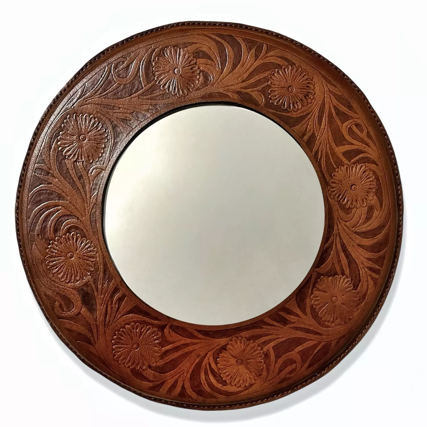 Tooled floral leather mirror image