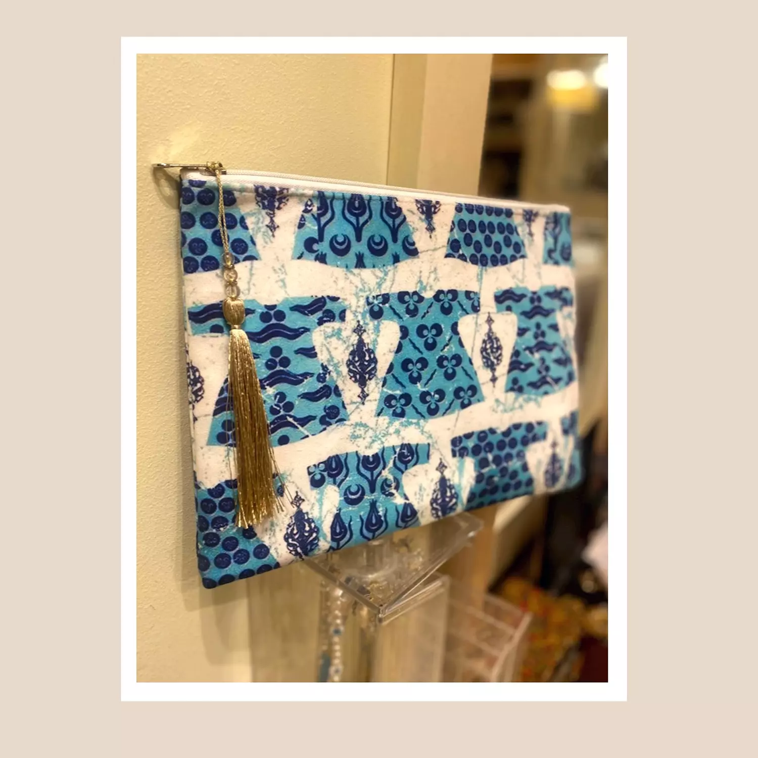 The Blue Kaftan Gold Tassel Pouch 1