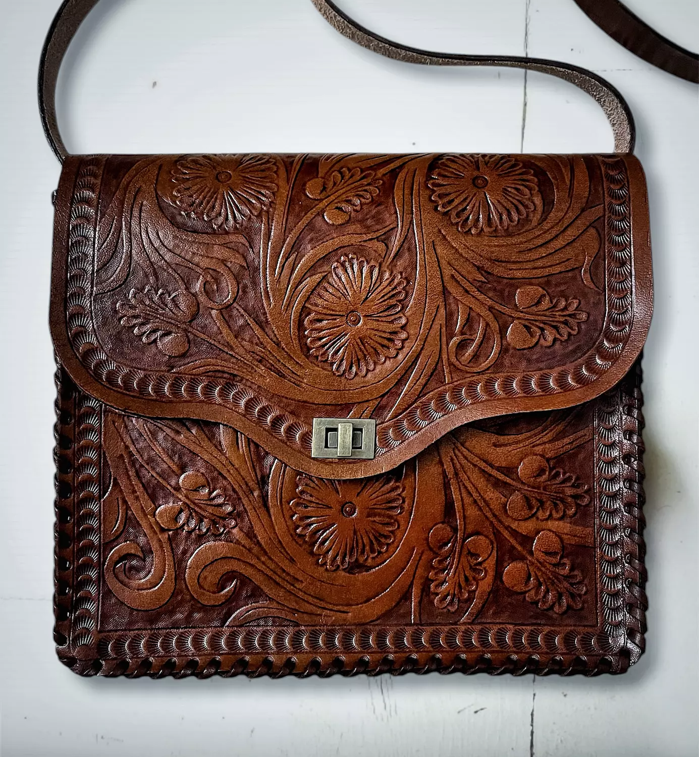 Fully Floral tooled leather bag  hover image