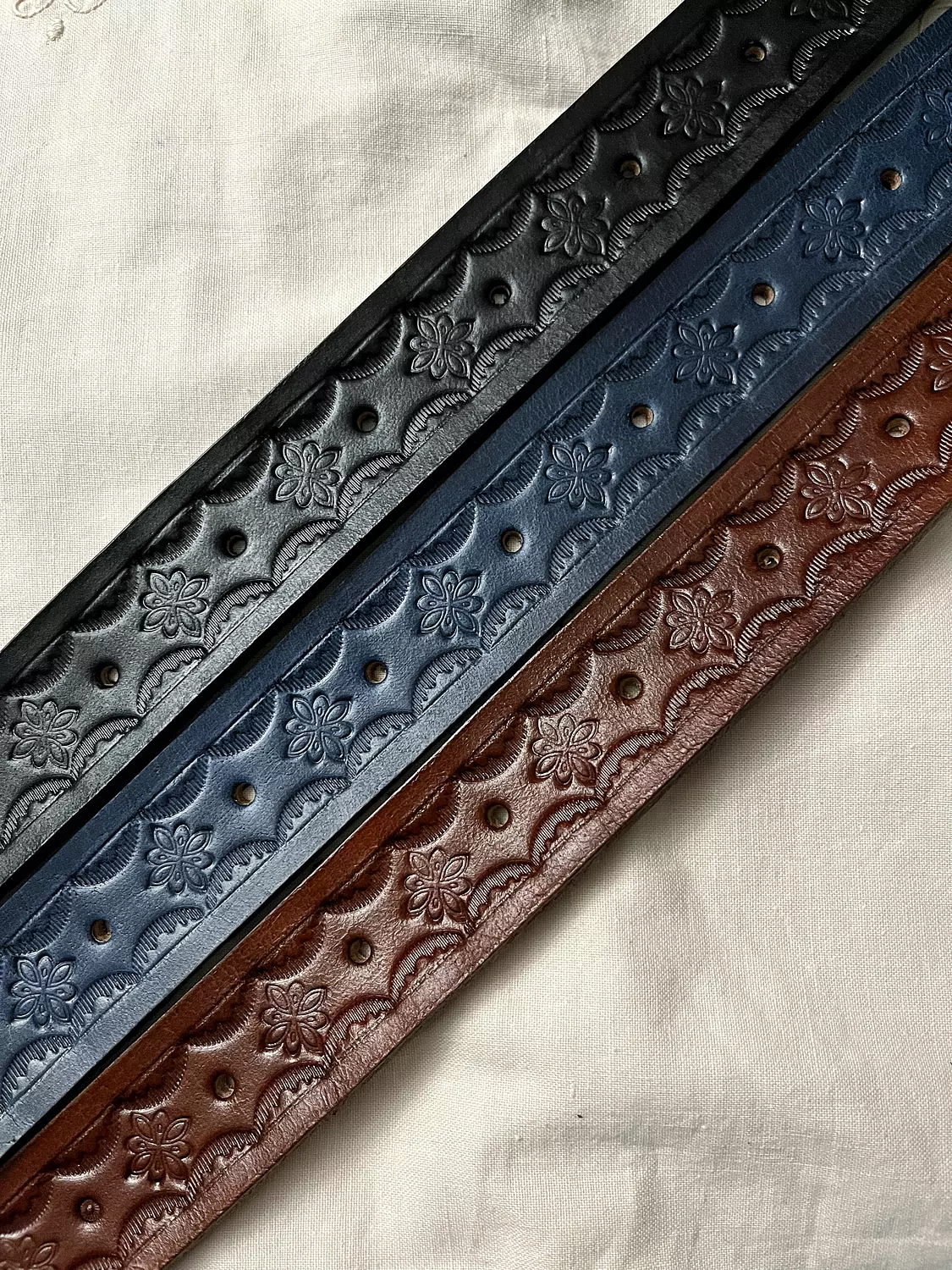 Tooled leather belt - Star flower hover image