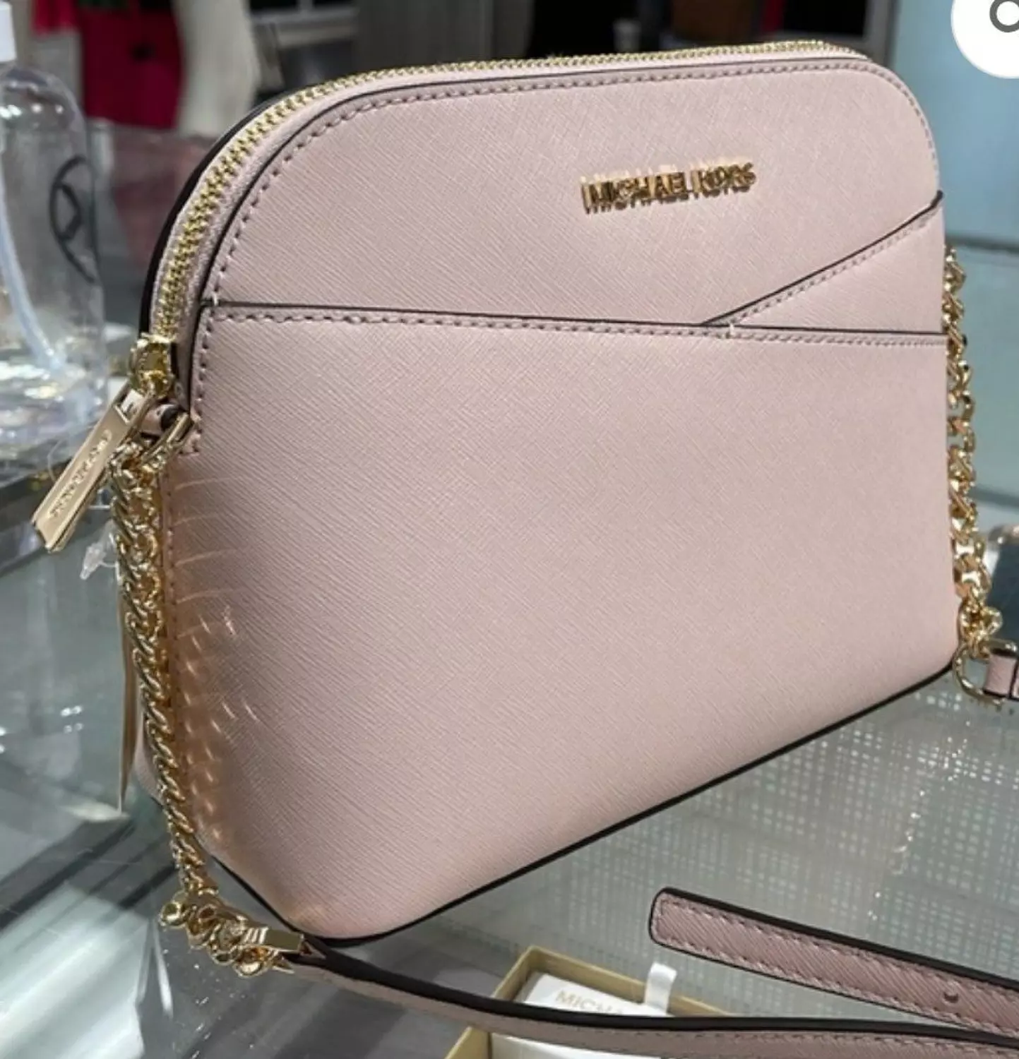 Michael kors dome or half-moon shaped crossbody bag  image