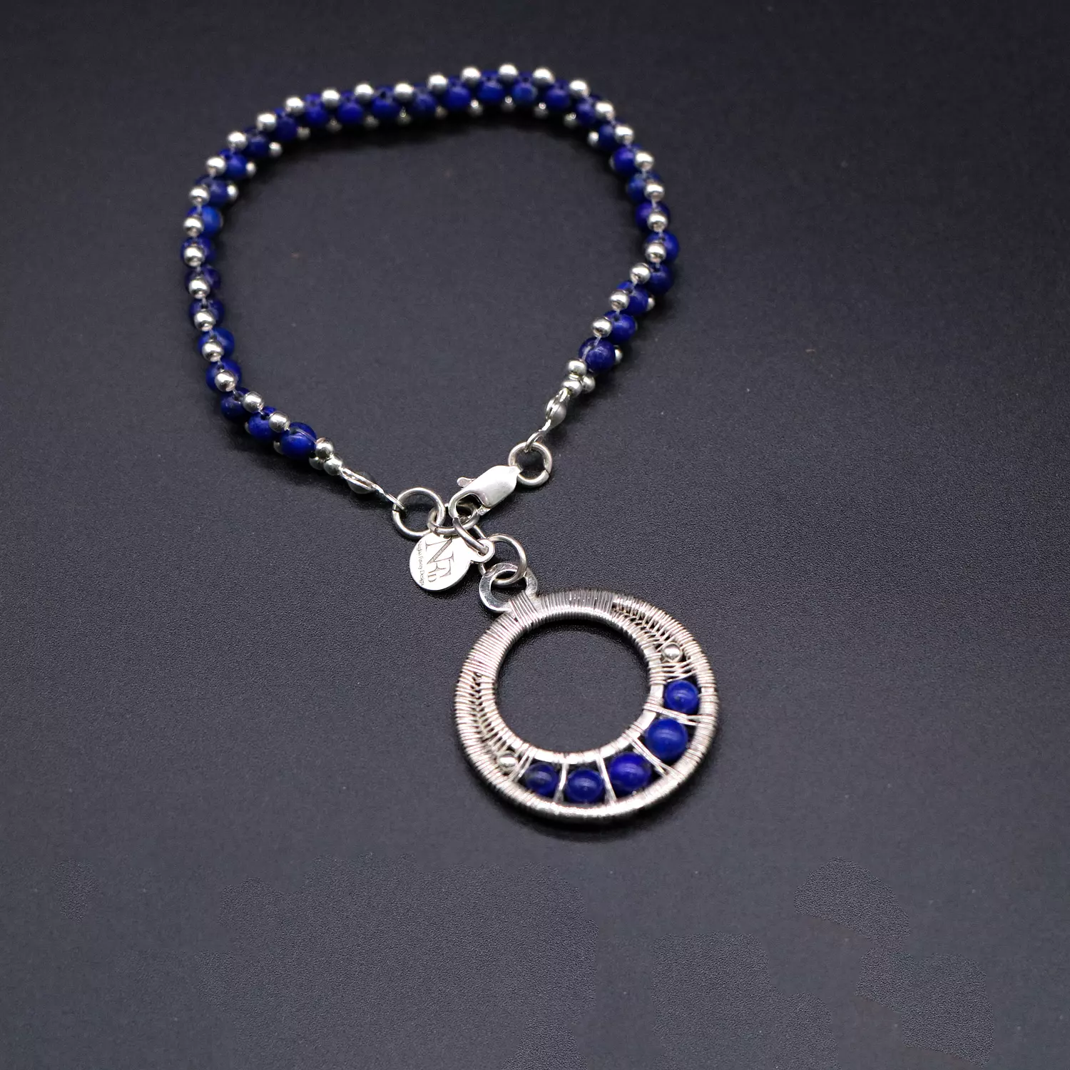  Lapis lazuli gemstones and silver balls bracelet with a wire wrapped Pendant.  image
