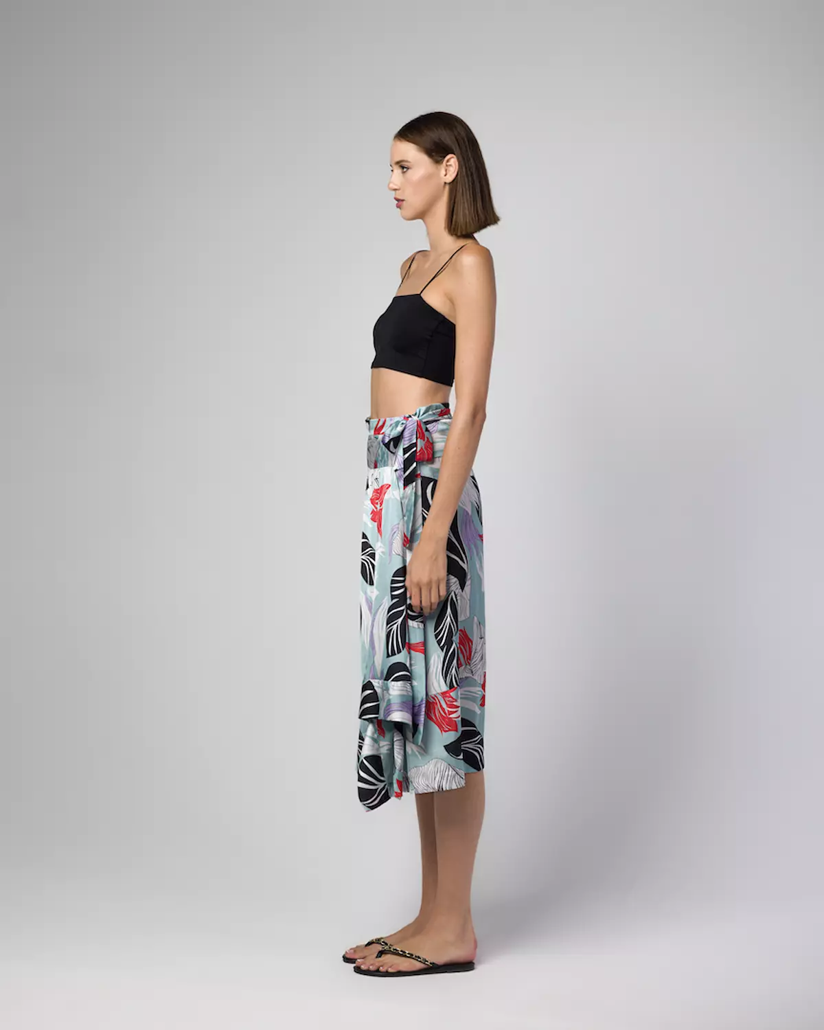 THE ASYMMETRIC WRAP SATIN SKIRT hover image