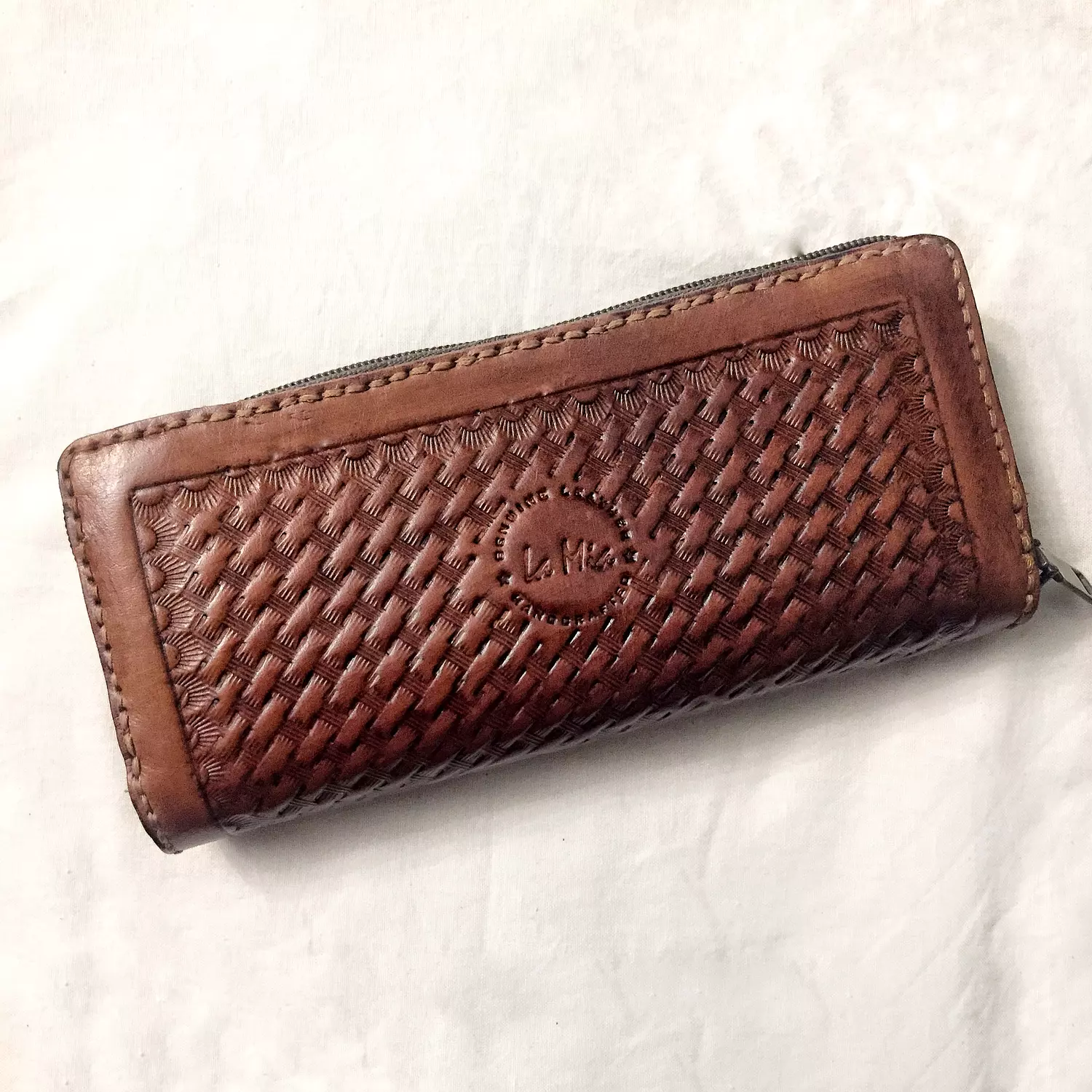 Floral tooled long leather wallet hover image