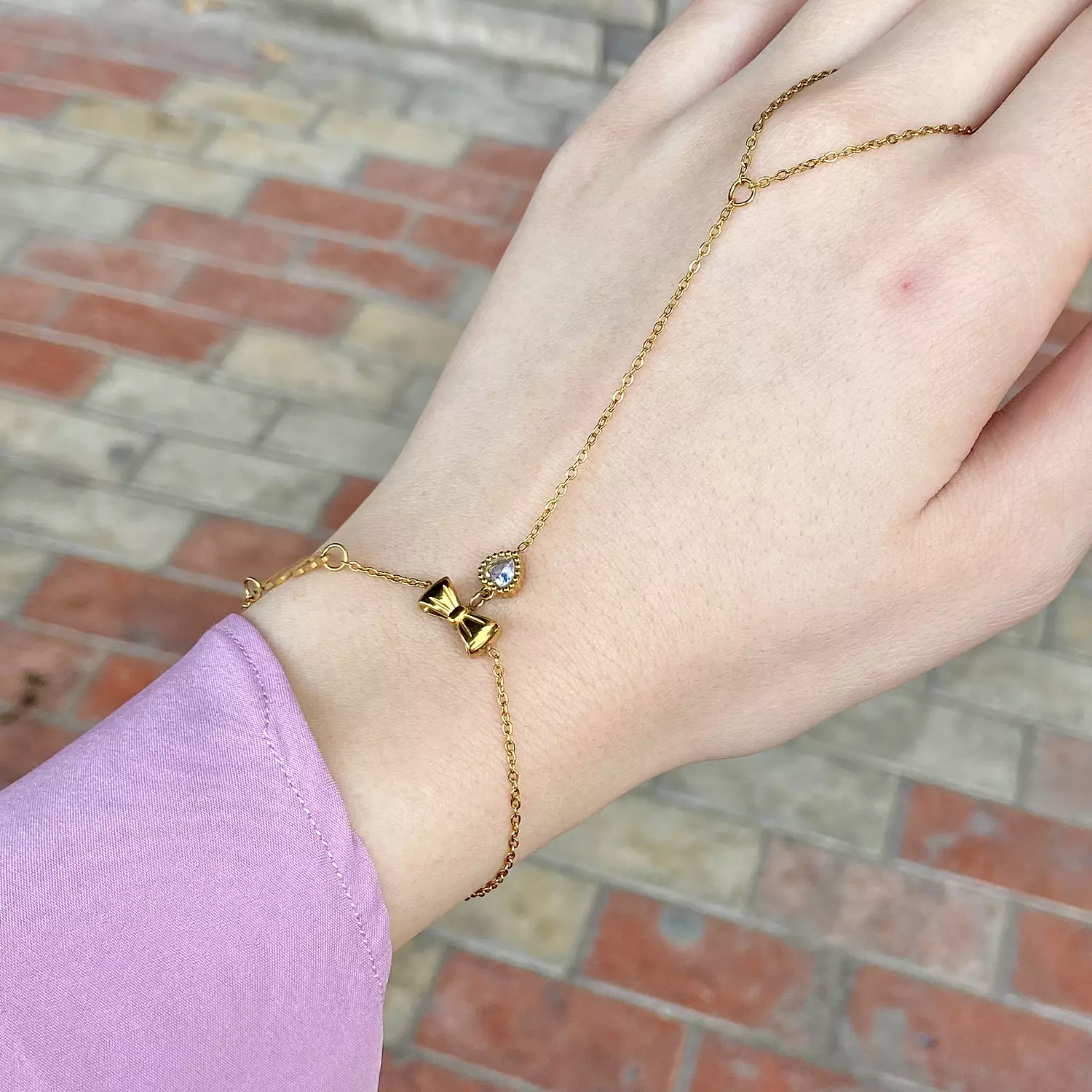 Stainless steel hand chain with 🎀and crystal ✨ 1