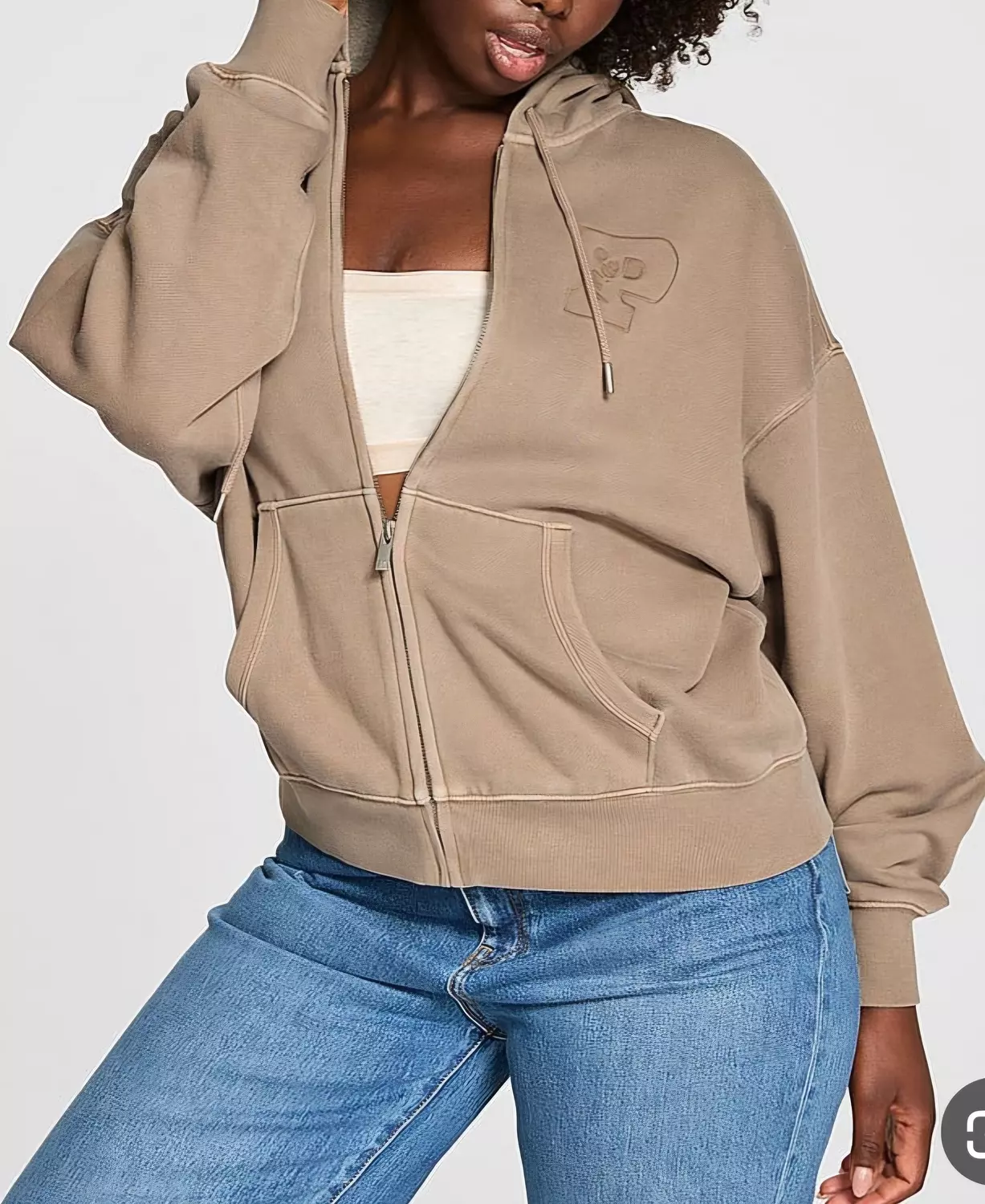A full-zip hoodie with a relaxed, oversized fit and dropped shoulders for a casual look. image