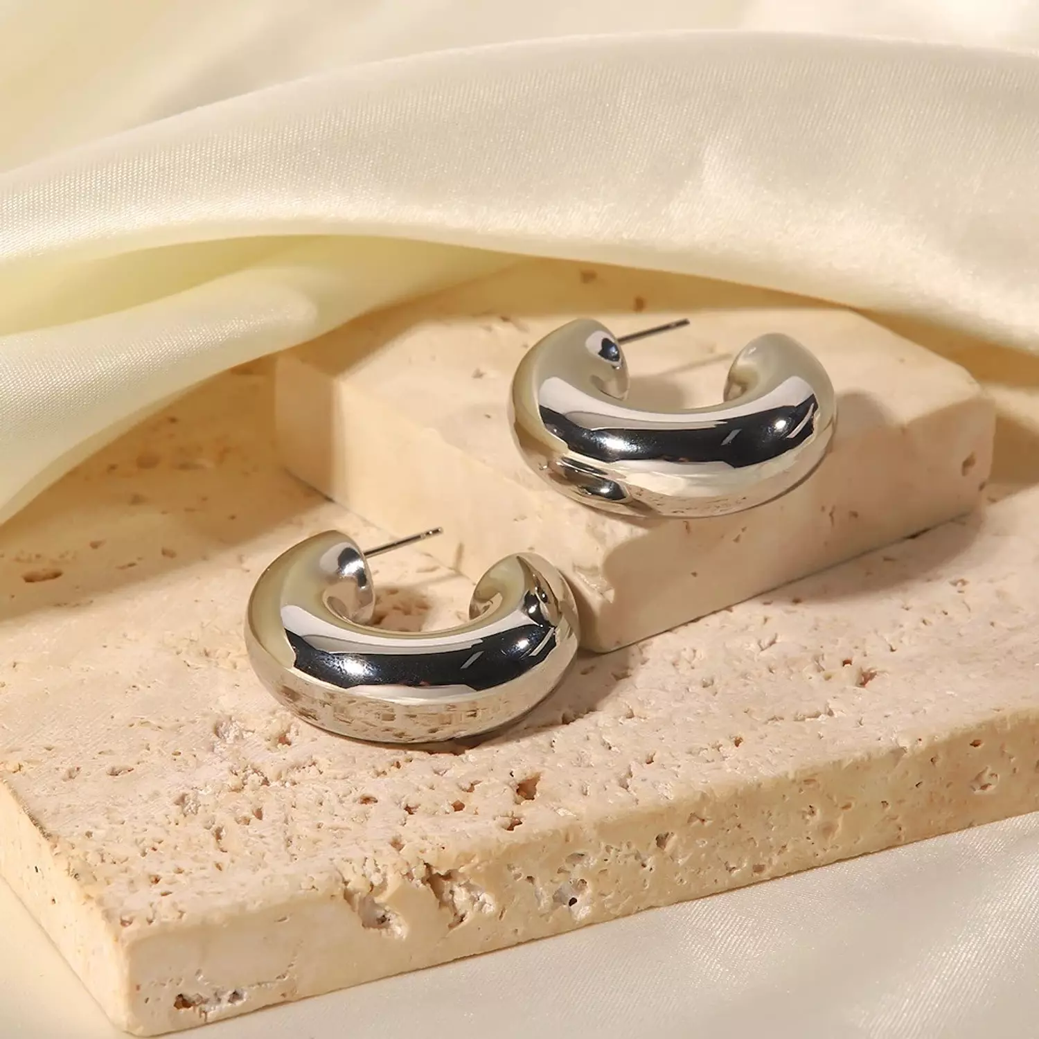 Chunky silver hoop earrings  hover image