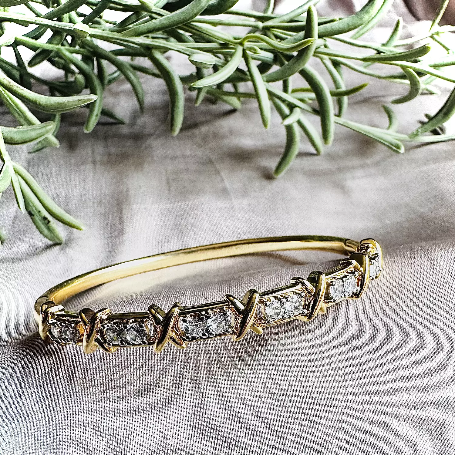 X-Shape gold plated zircon bangle hover image