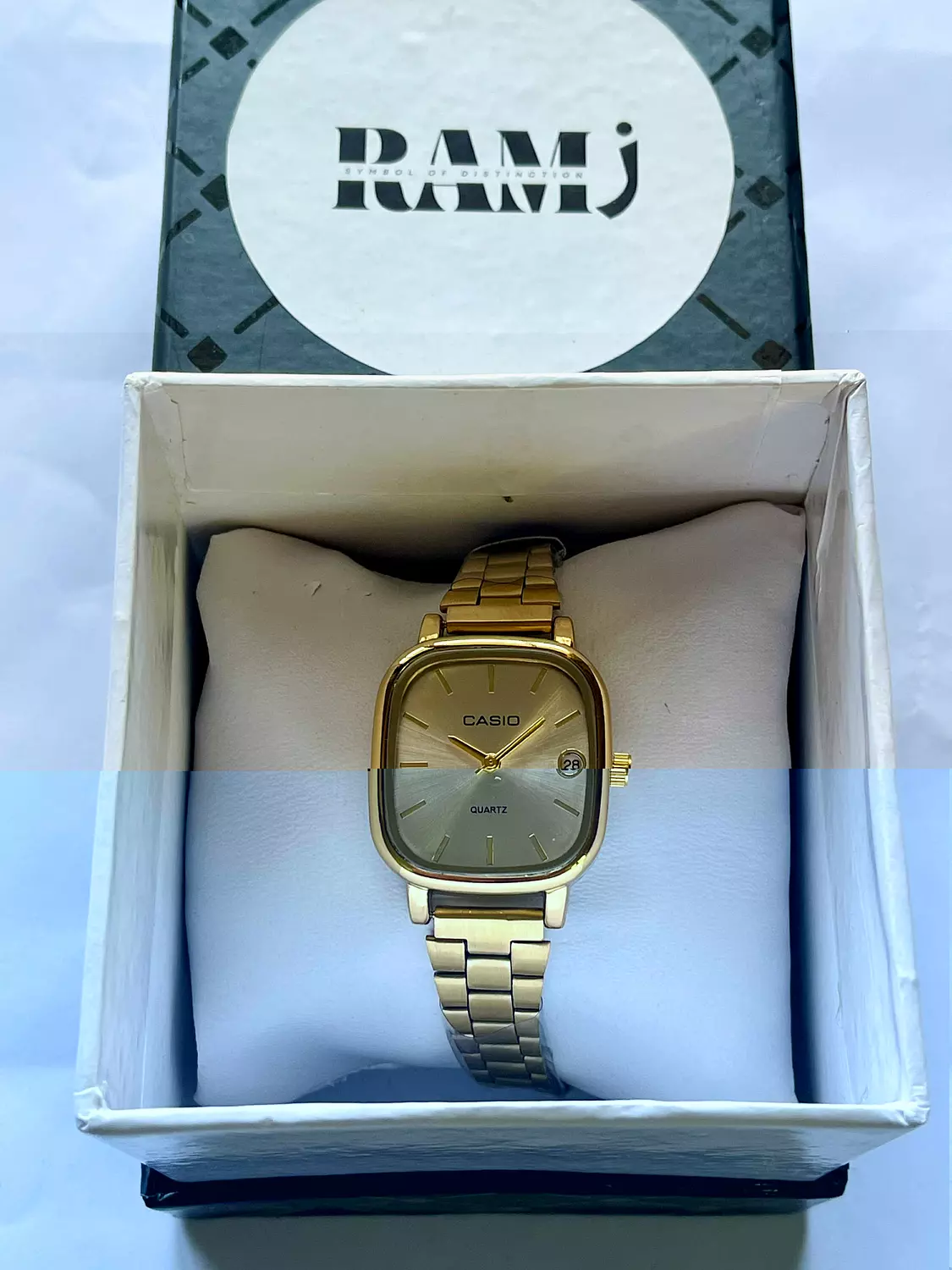 Female old money casio Gold x White hover image