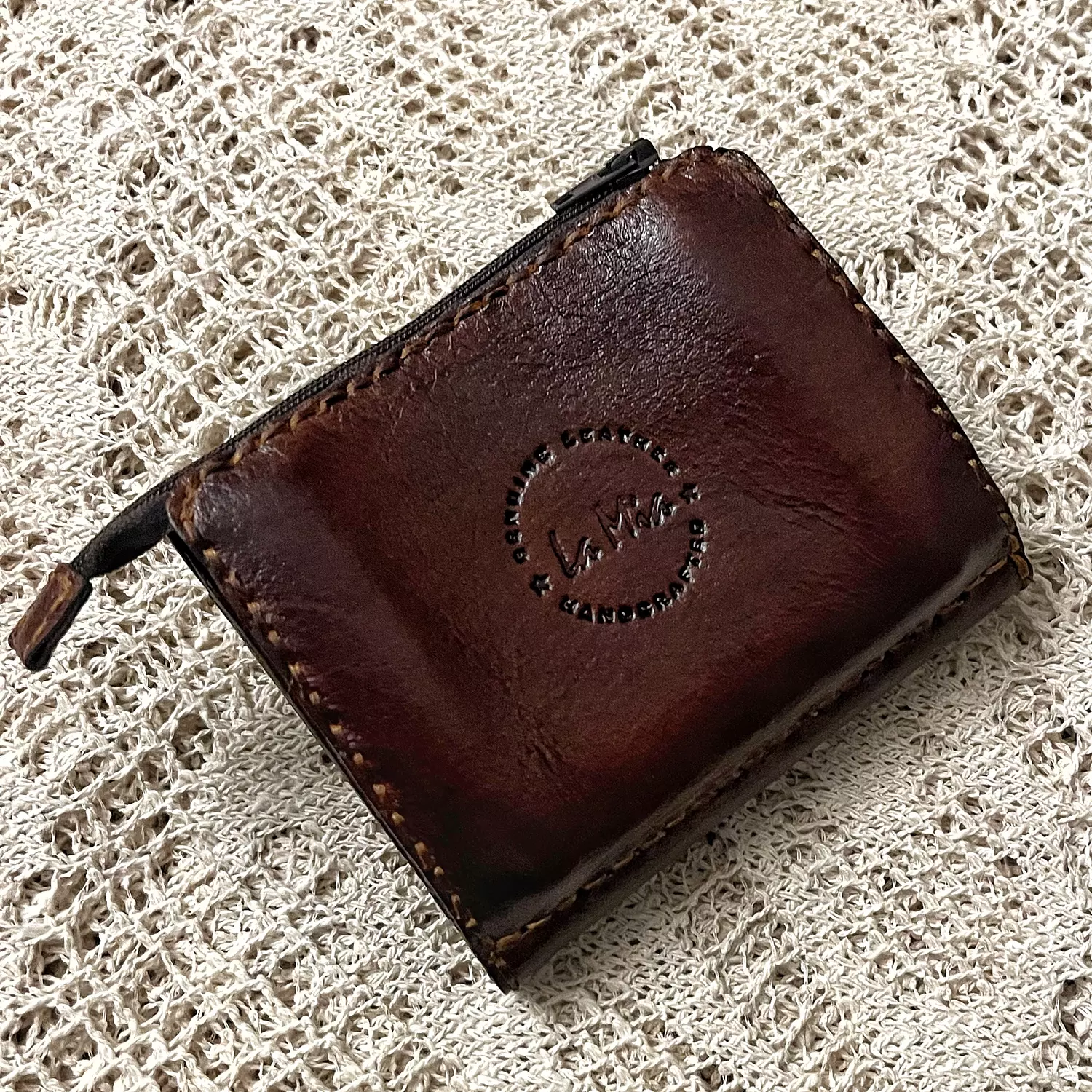 Birds & branches tooled leather wallet -flap closure hover image