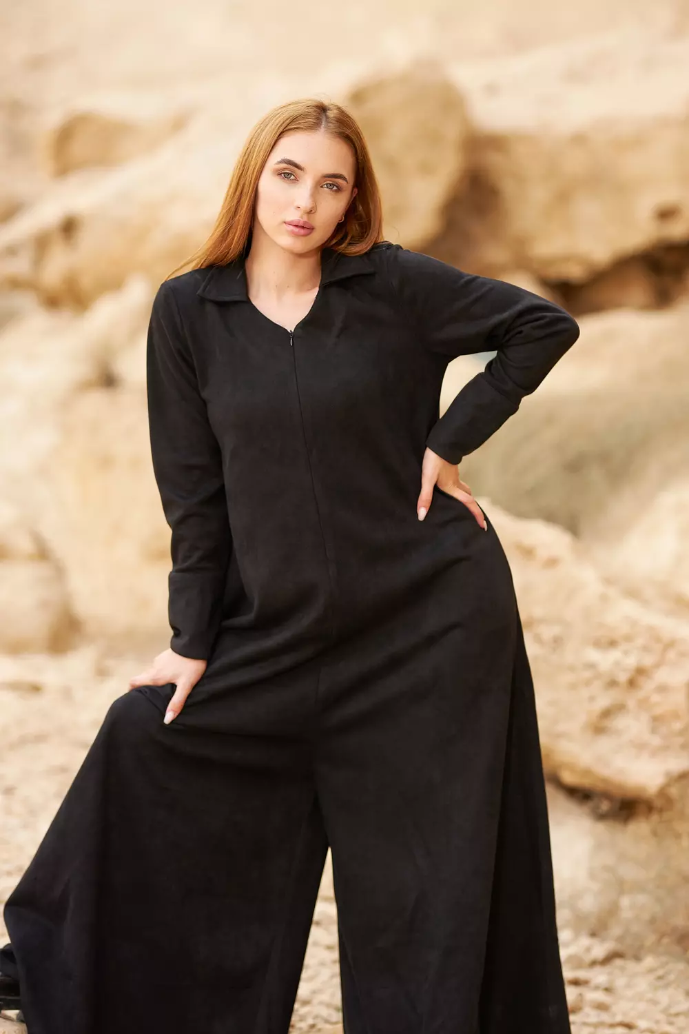Black winter jumpsuit made of suede image