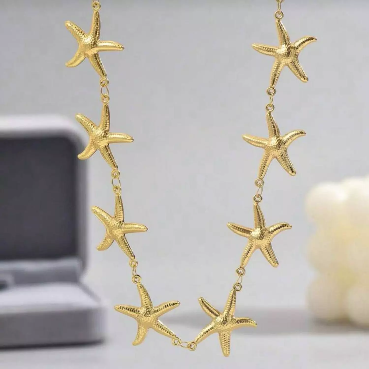Gold star necklace  image