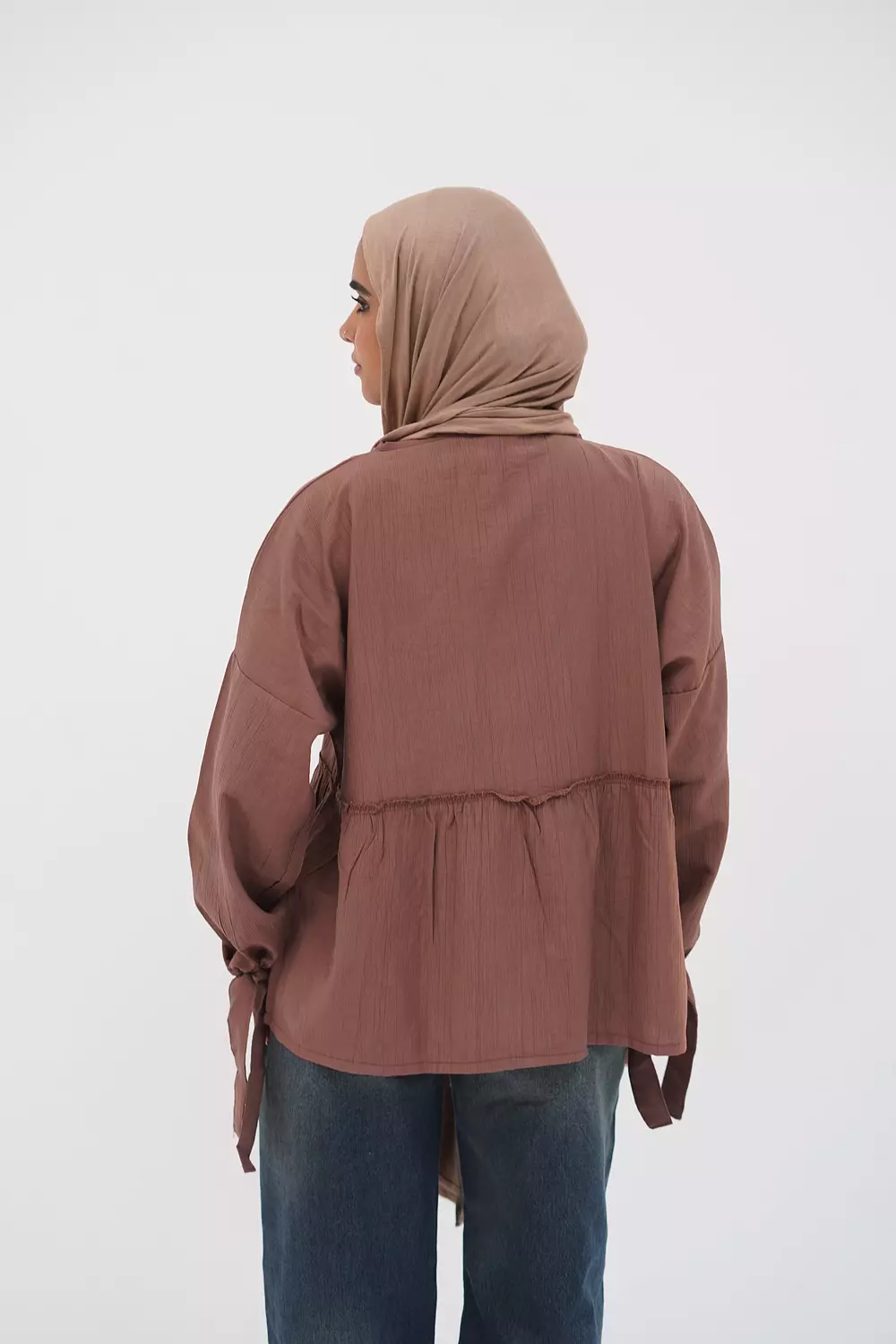 Brown blouse with tie from the callar 1